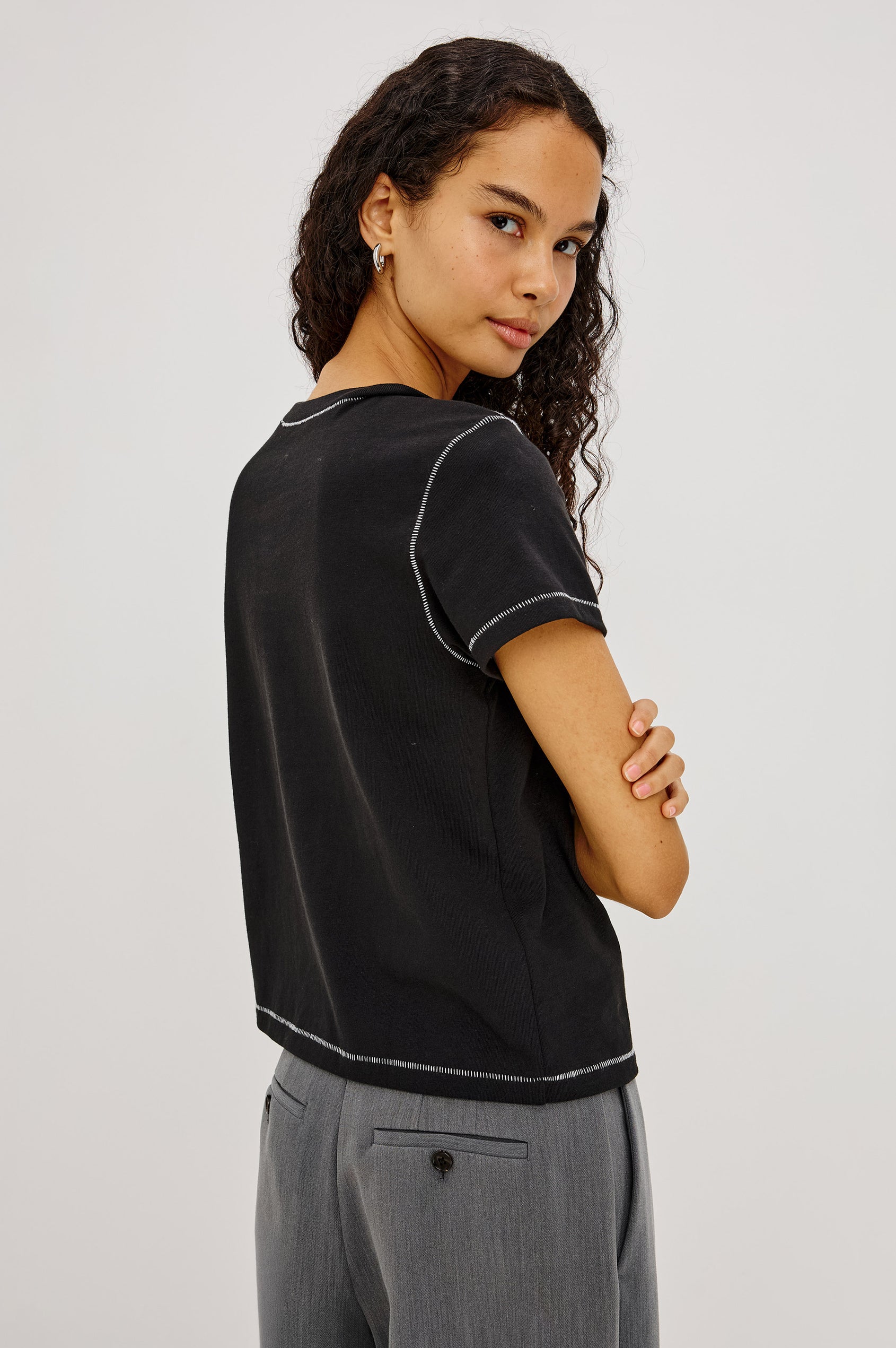 Girlfriend Pleated Jersey Tee With Crew Neckline, Short Sleeves, and Relaxed Slightly-Boxy Fit in Black Contrast Stitch Colorway - Upper Body Back View Featured on Model