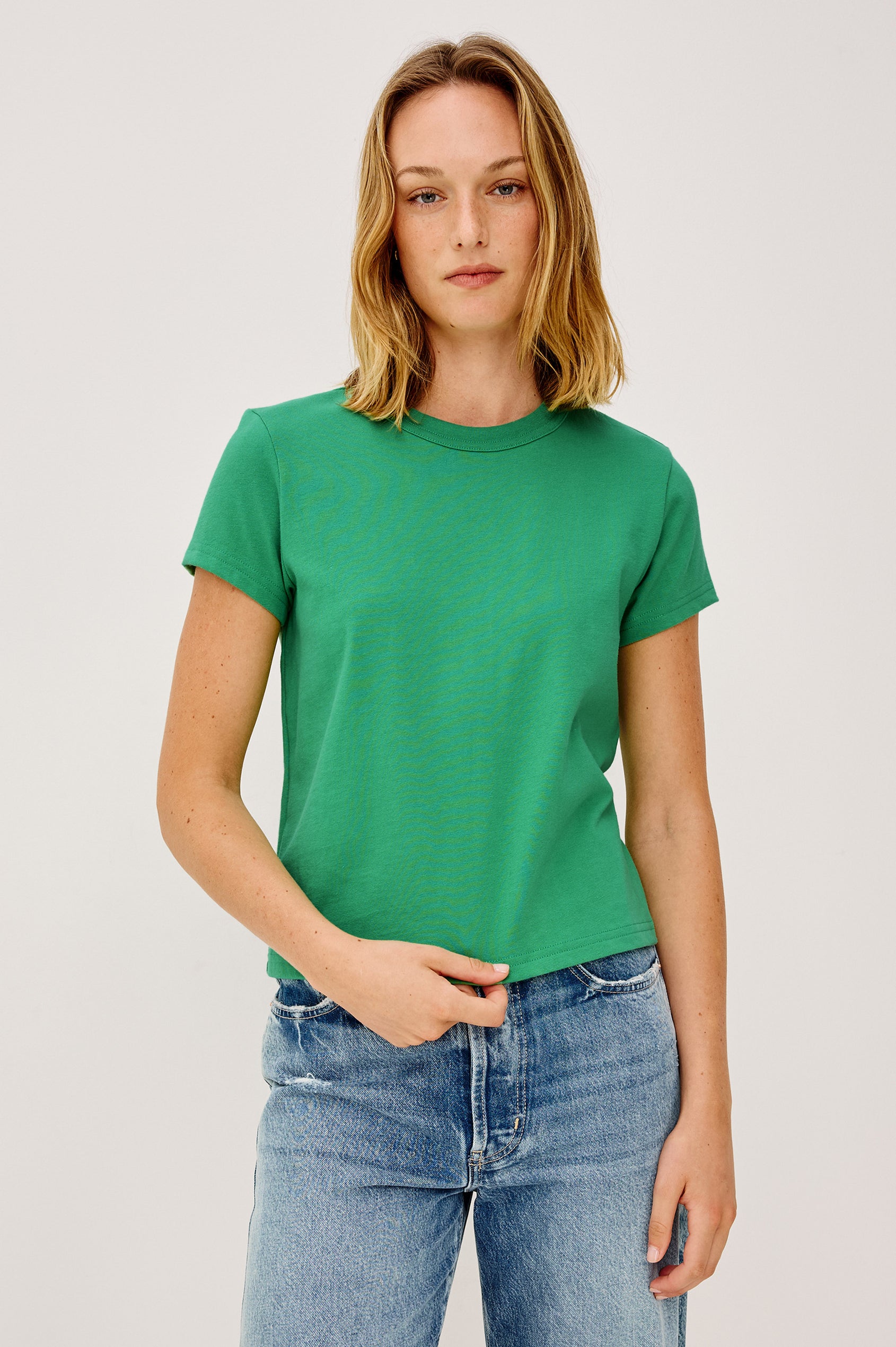 Girlfriend T-Shirt in 100% Cotton With Slightly Boxy Cropped Fit, Crew Neckline, and Short Sleeves in Clover Colorway - Upper Body Front View Featured on Model