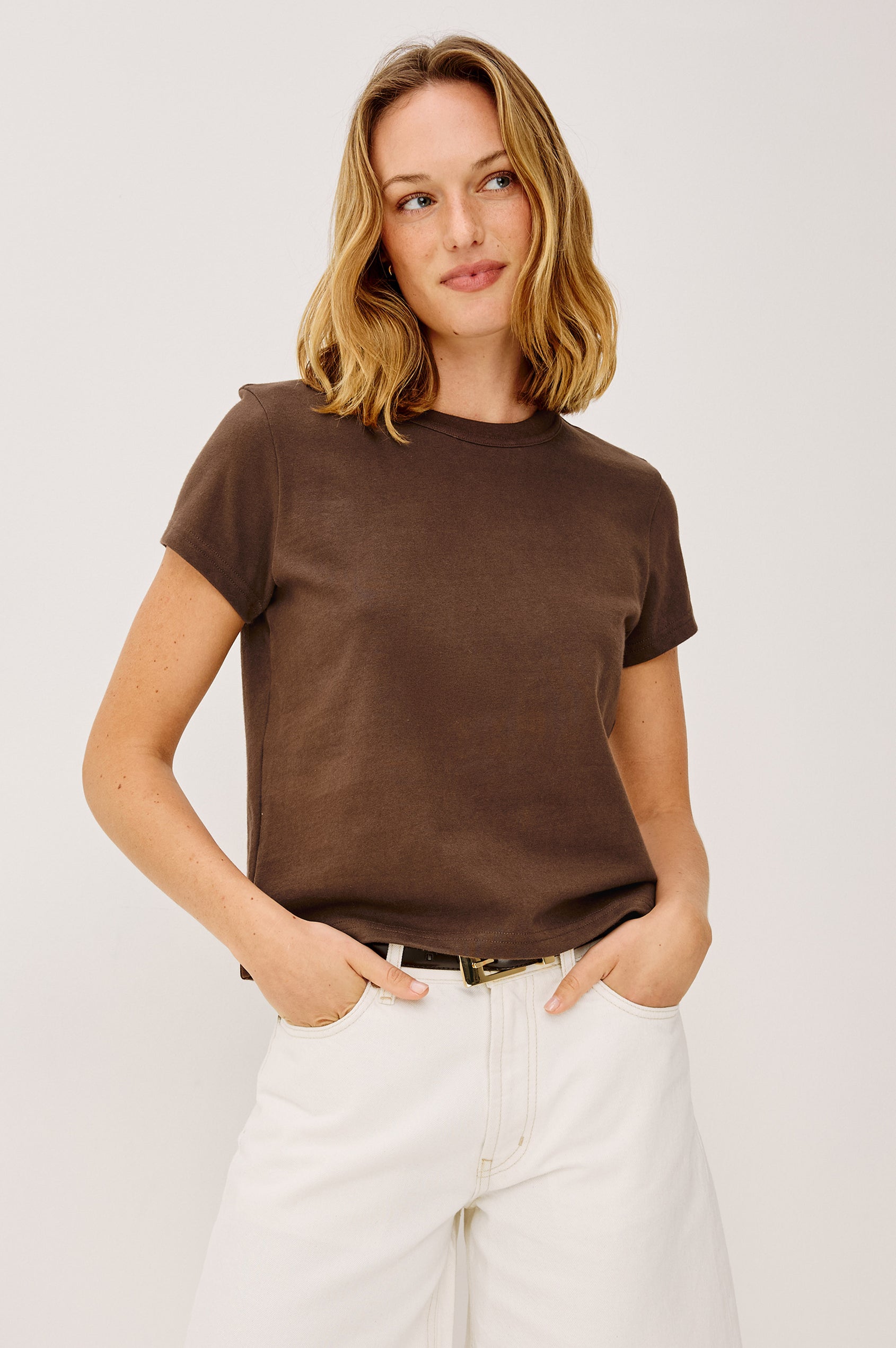 Girlfriend T-Shirt in 100% Cotton With Slightly Boxy Cropped Fit, Crew Neckline, and Short Sleeves in Espresso Colorway - Upper Body Front View Featured on Model