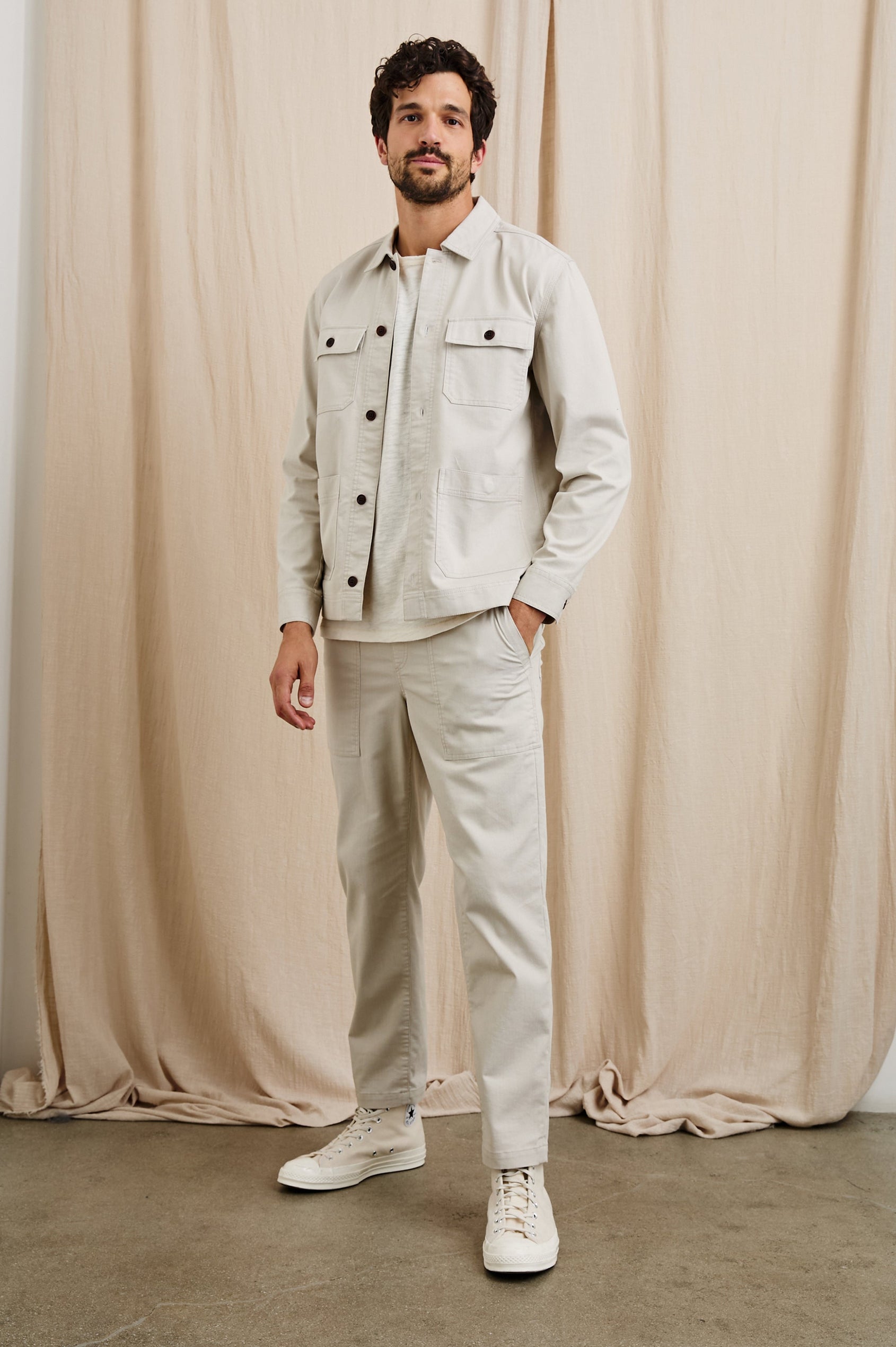 Gobi Pants with Drawstring Waist, Two Large Front Pockets and Two Back Buttoned Patch Pockets in Oat Railroad Dobby Colorway - Front Full Body View Featured on Model