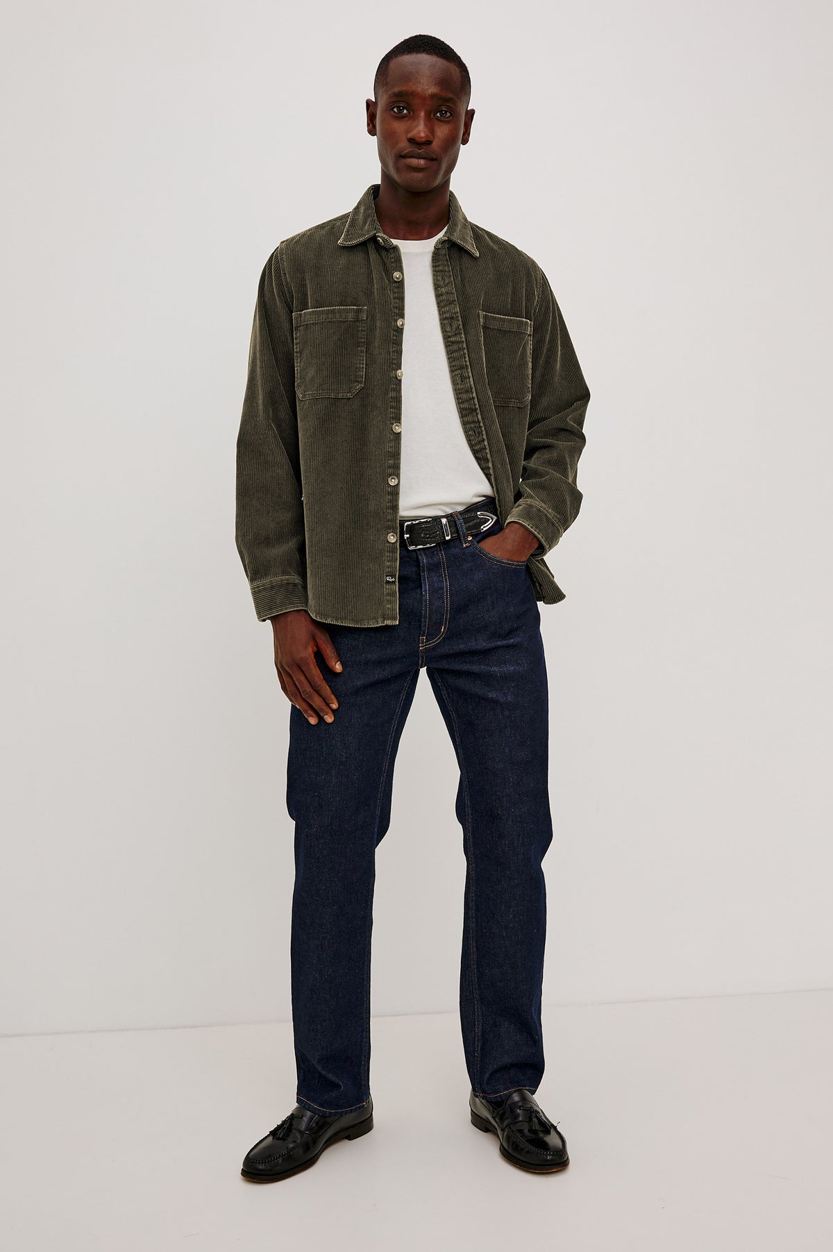 Graham Overshirt in Corduroy With Vintage Wash, Relaxed Fit, Collar, Chest Patch Pocket, and Front Buttons in Lichen Green Colorway - Full Body Front View Featured on Model