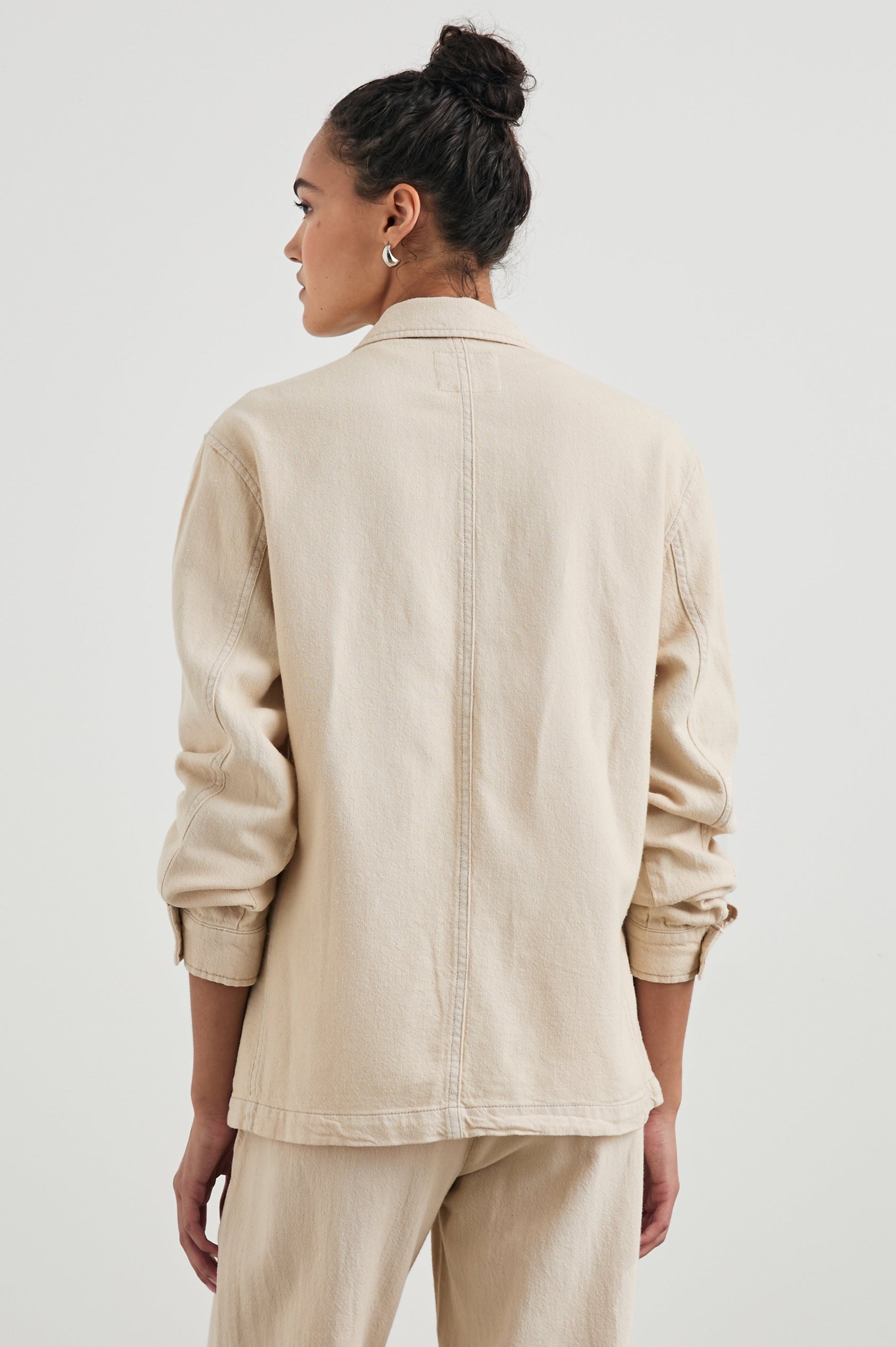 Gwen Jacket with Button Closure, Two Front Patch Pockets and a Chest Patch Pocket in Stone Colorway - Back View Featured on Model 