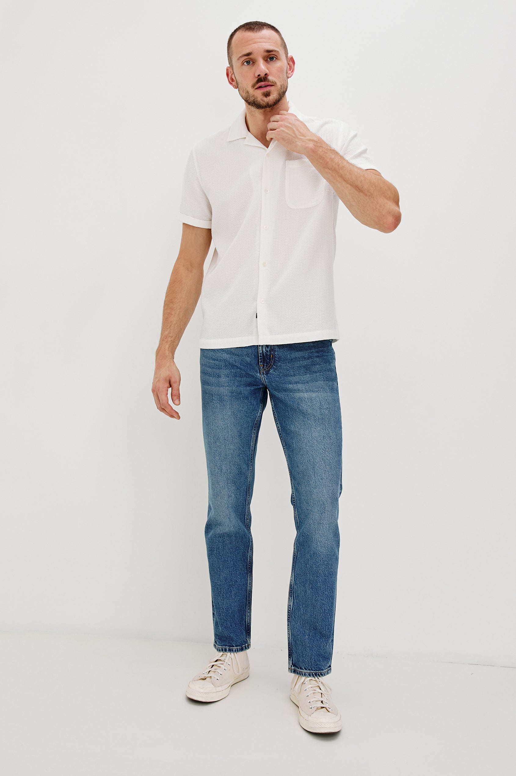 Haney Collared Button Front Shirt with Short Sleeves and a Chest Pocket in White Colorway. Full Body Front View Shown on Model.