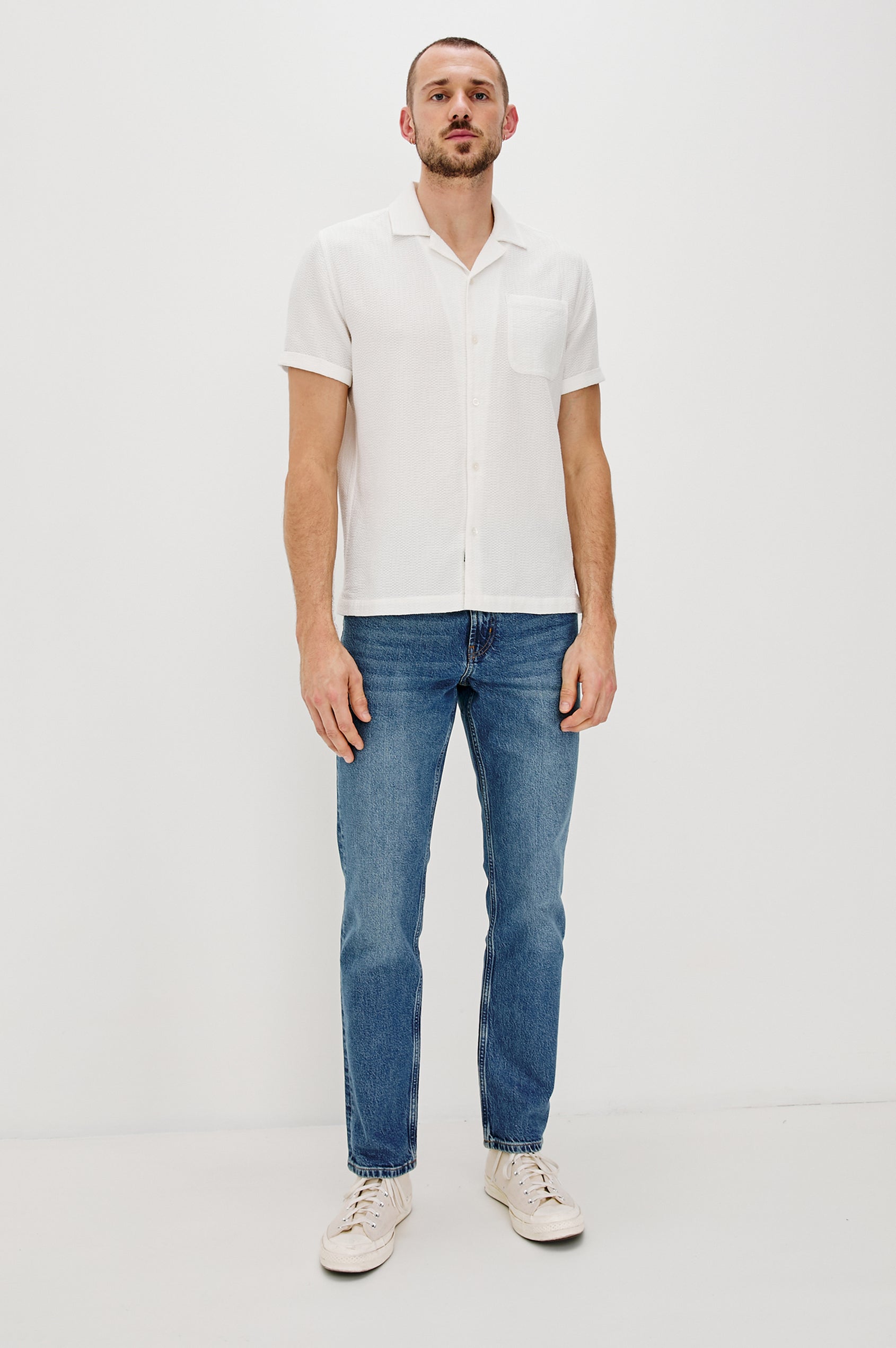 Haney Collared Button Front Shirt with Short Sleeves and a Chest Pocket in White Colorway. Full Body Front View Shown on Model.