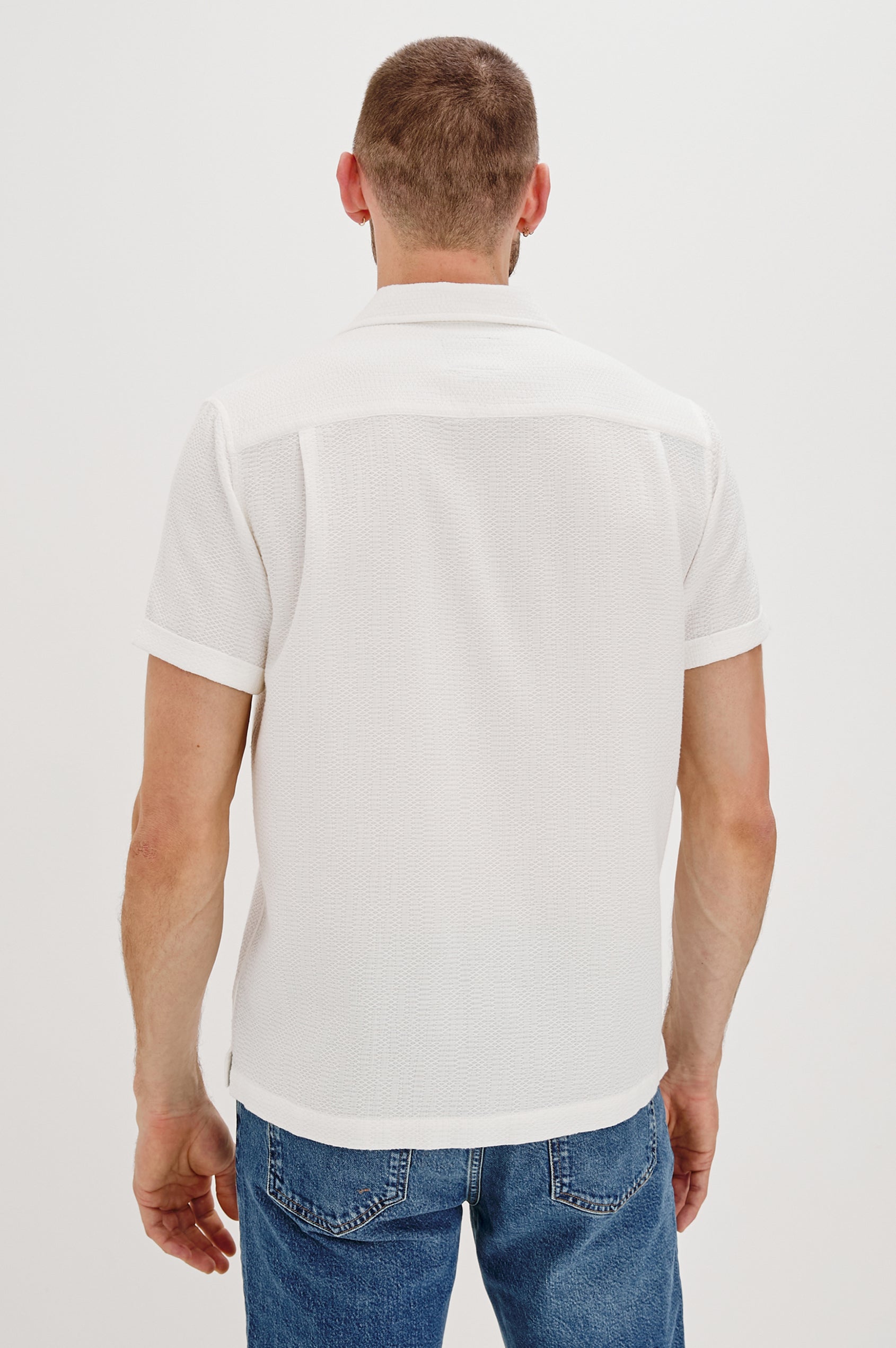 Haney Collared Button Front Shirt with Short Sleeves and a Chest Pocket in White Colorway. Back View Shown on Model.