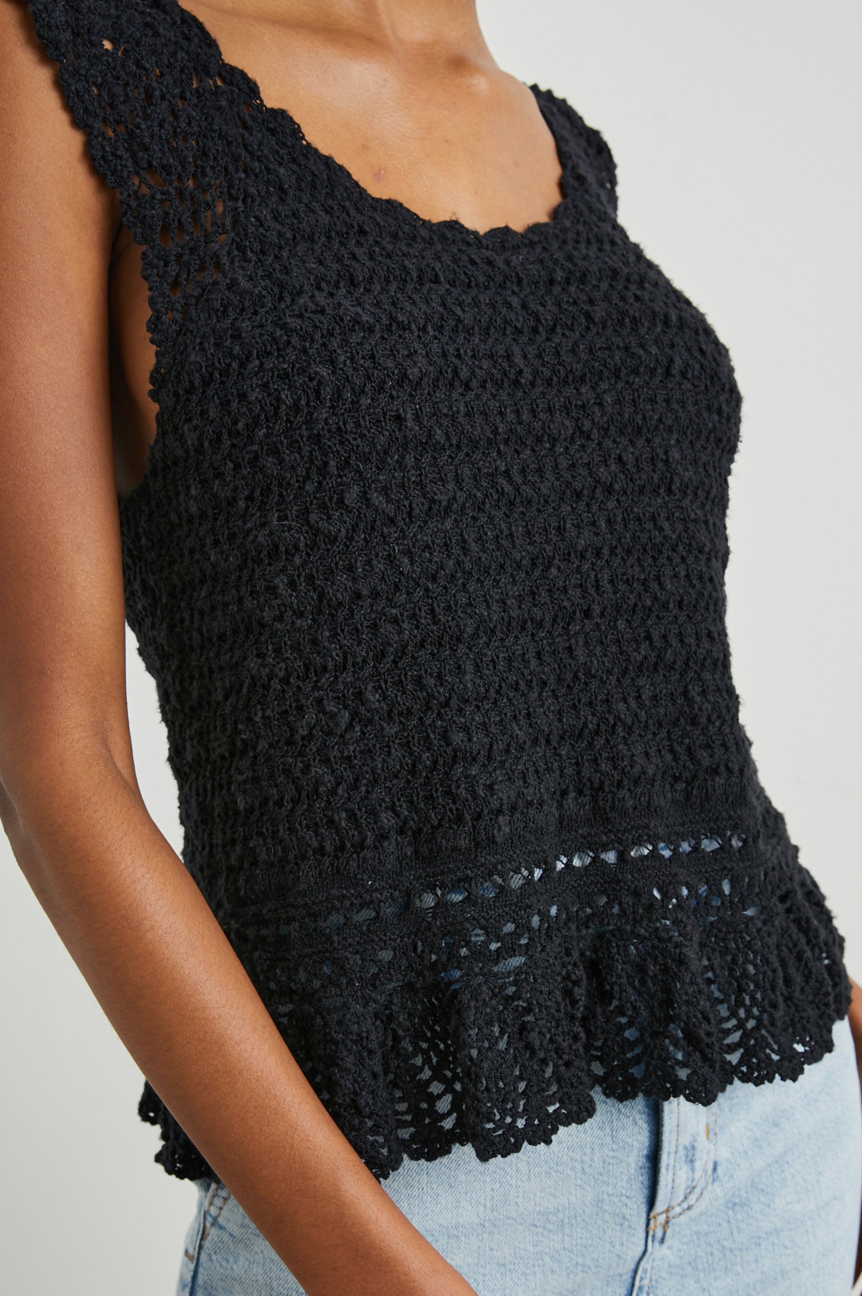 Hattie Crocheted Tank Top with Wide Shoulder Straps, a Scoop Neck and a Crocheted Design at the Hem in Black Colorway - Front View Featured on Model 