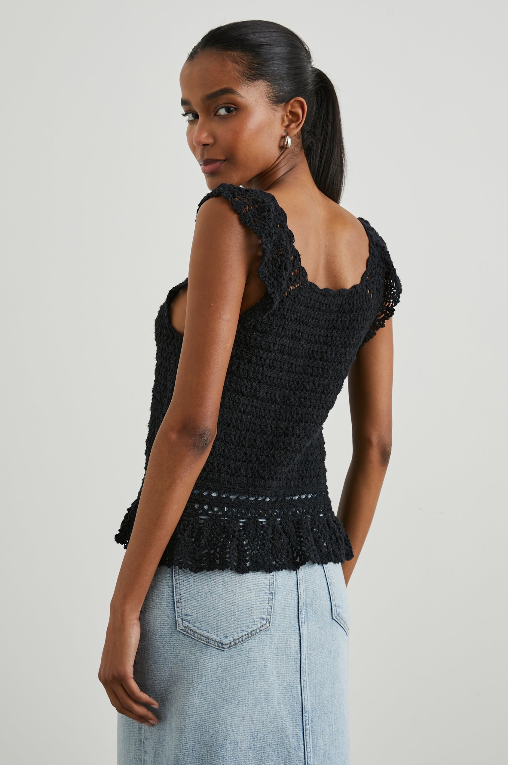 Hattie Crocheted Tank Top with Wide Shoulder Straps, a Scoop Neck and a Crocheted Design at the Hem in Black Colorway - Back View Featured on Model 