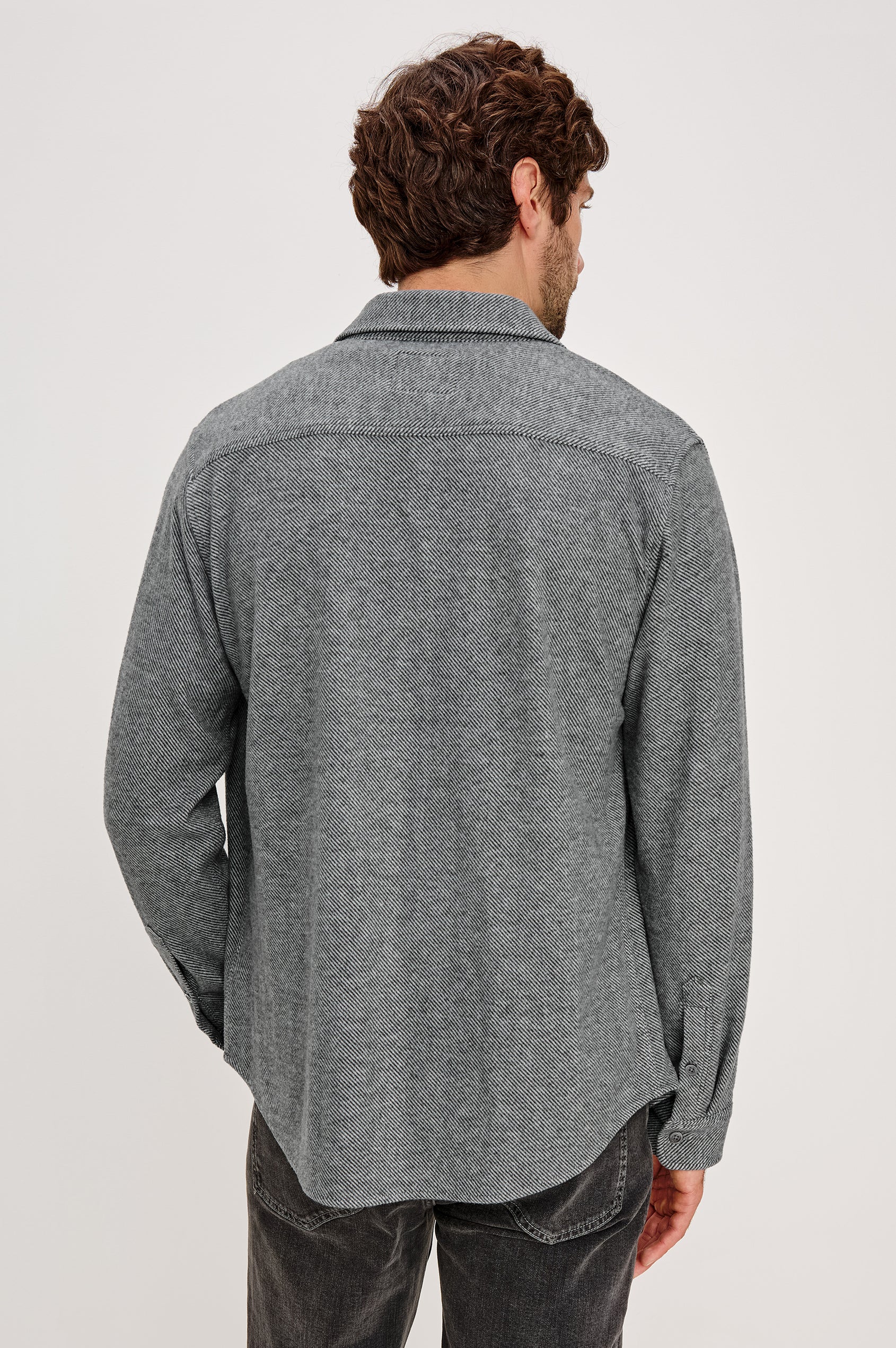 Hawke Long Sleeve Button Front Shirt with a Chest Pocket in Charcoal Twill Colorway. Back View Featured on Model.