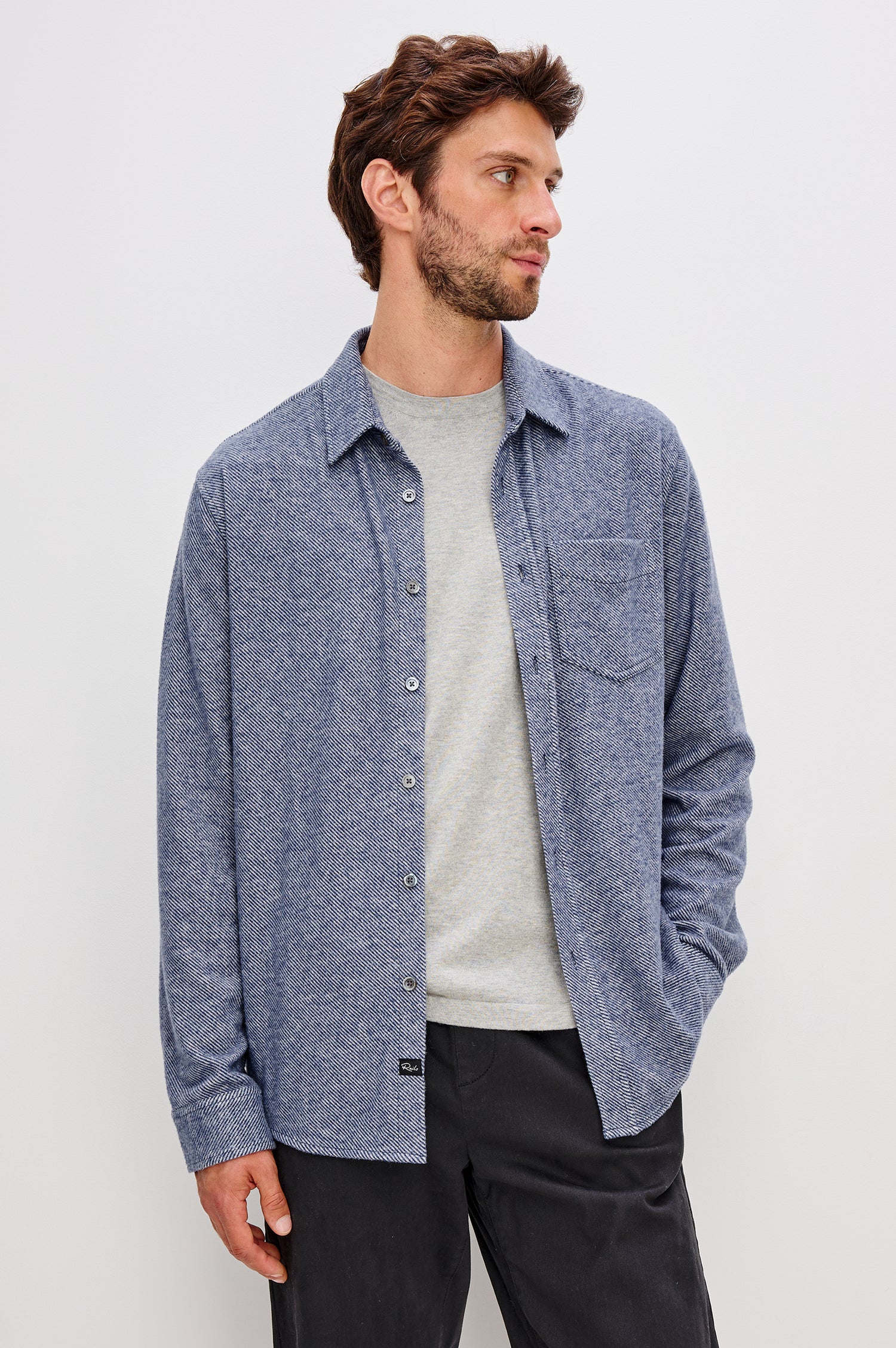 Hawke Long Sleeve Button Front Shirt with a Chest Pocket in Marine Twill Colorway. Front View Featured on Model.