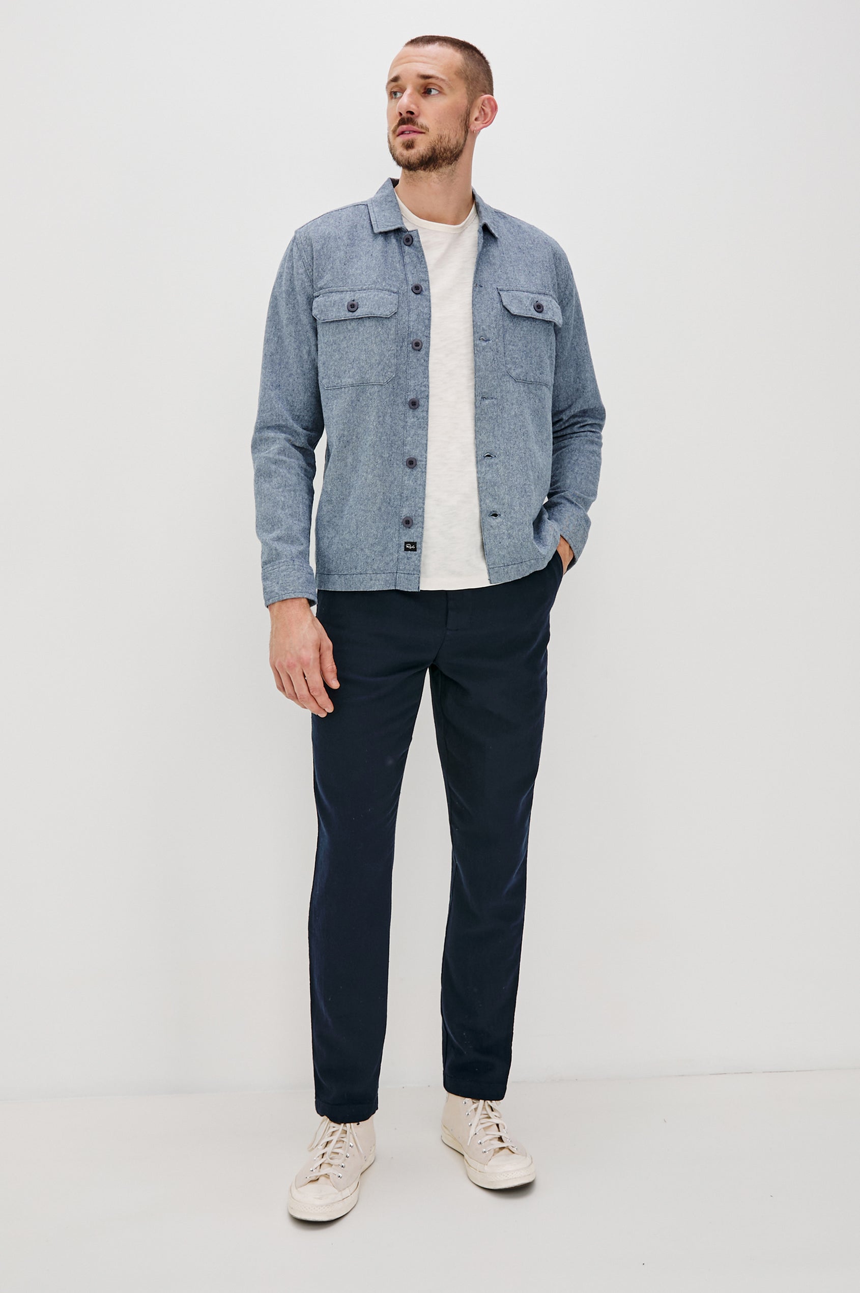 Hayes Shirt Jacket with Long Sleeves and Chest Flap Pockets with Button Closure, Exposed Button Front in Blue Mirage. Full Body Front View Shown on Model.