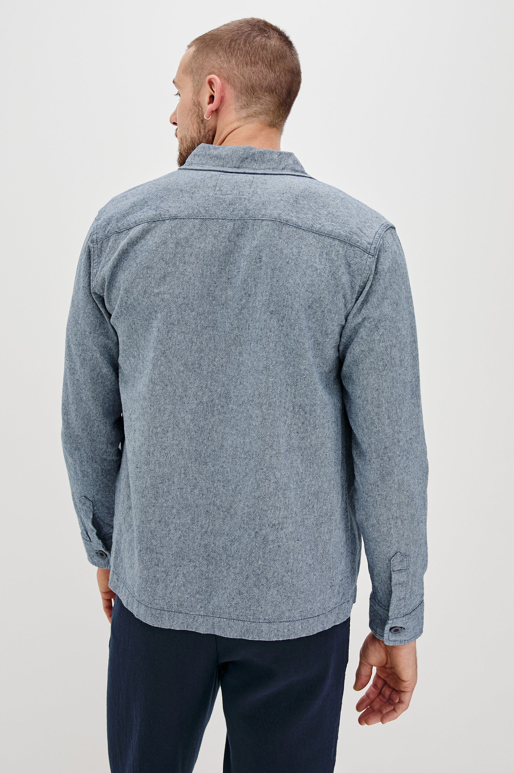 Hayes Shirt Jacket with Long Sleeves and Chest Flap Pockets with Button Closure, Exposed Button Front in Blue Mirage. Back View Shown on Model.