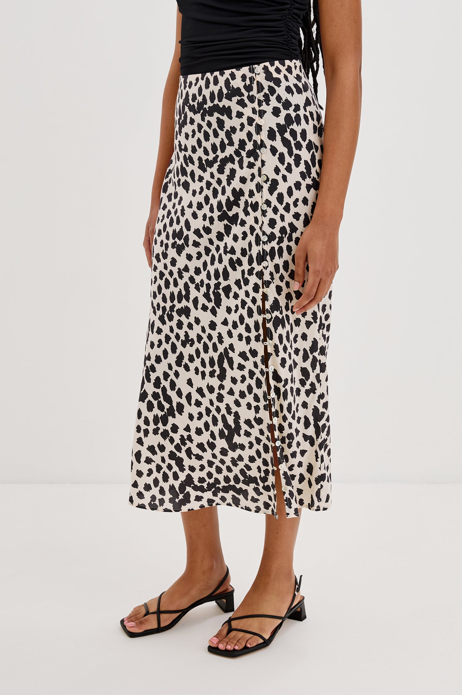 Hepburn Midi Skirt with Forward Facing Adjustable Button Front Side Seam in Taupe Spotted Colorway. Front View Shown on Model.