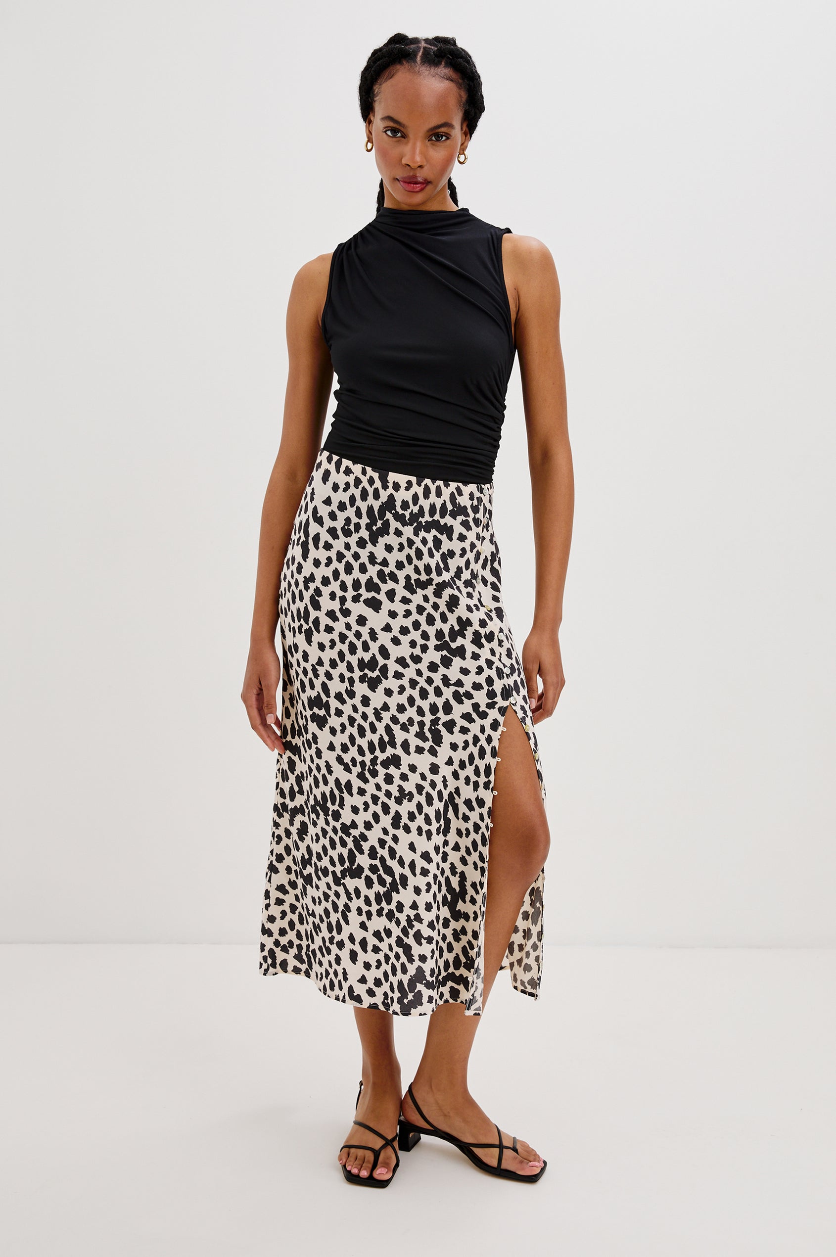 Hepburn Midi Skirt with Forward Facing Adjustable Button Front Side Seam in Taupe Spotted Colorway. Front View Shown on Model.