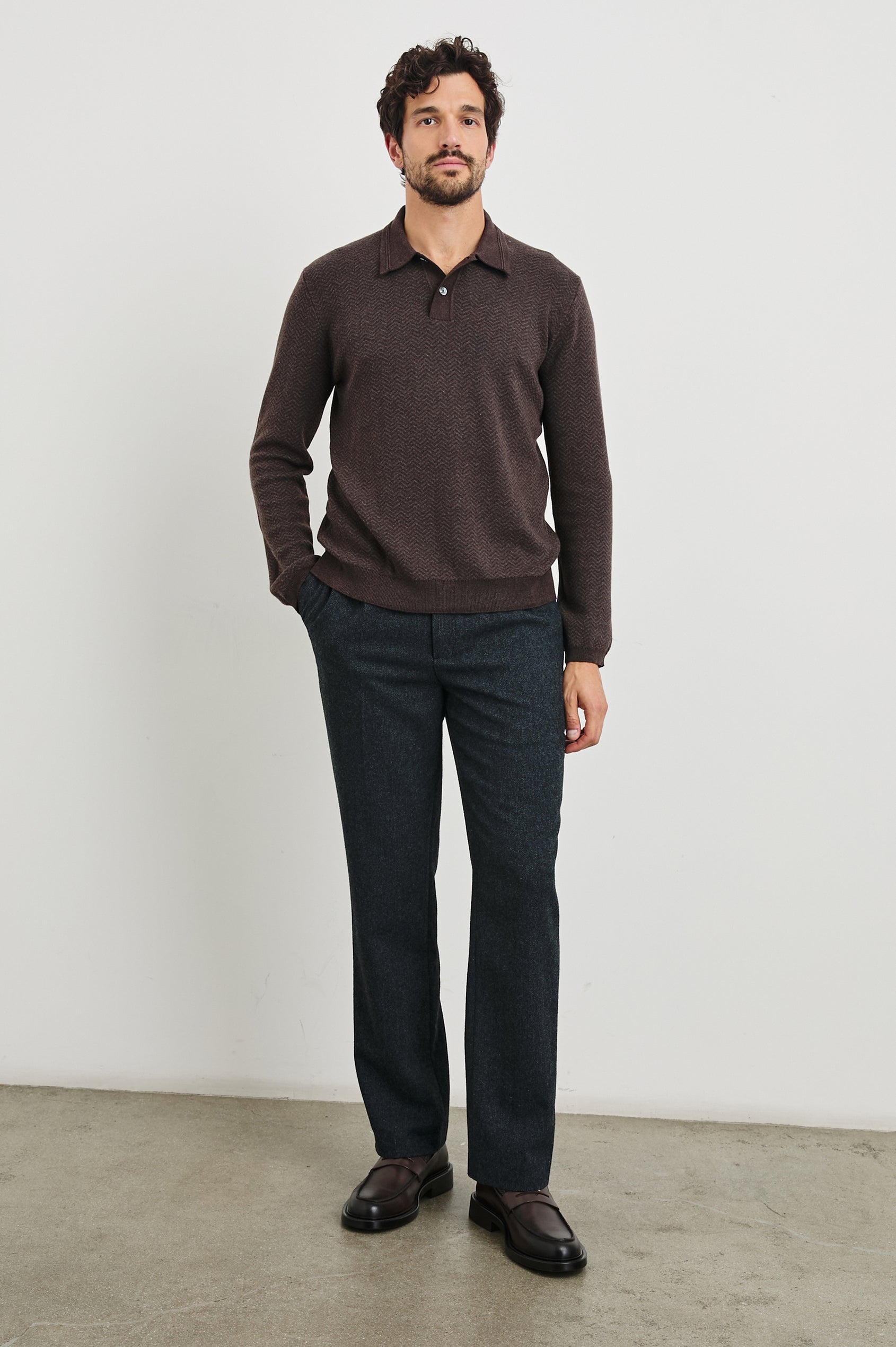 Herrington Long-Sleeve Collared Sweater with a Two Button Placket and a Herringbone Jacquard in Brown Herringbone Melange Colorway - Front Full Body View Featured on Model