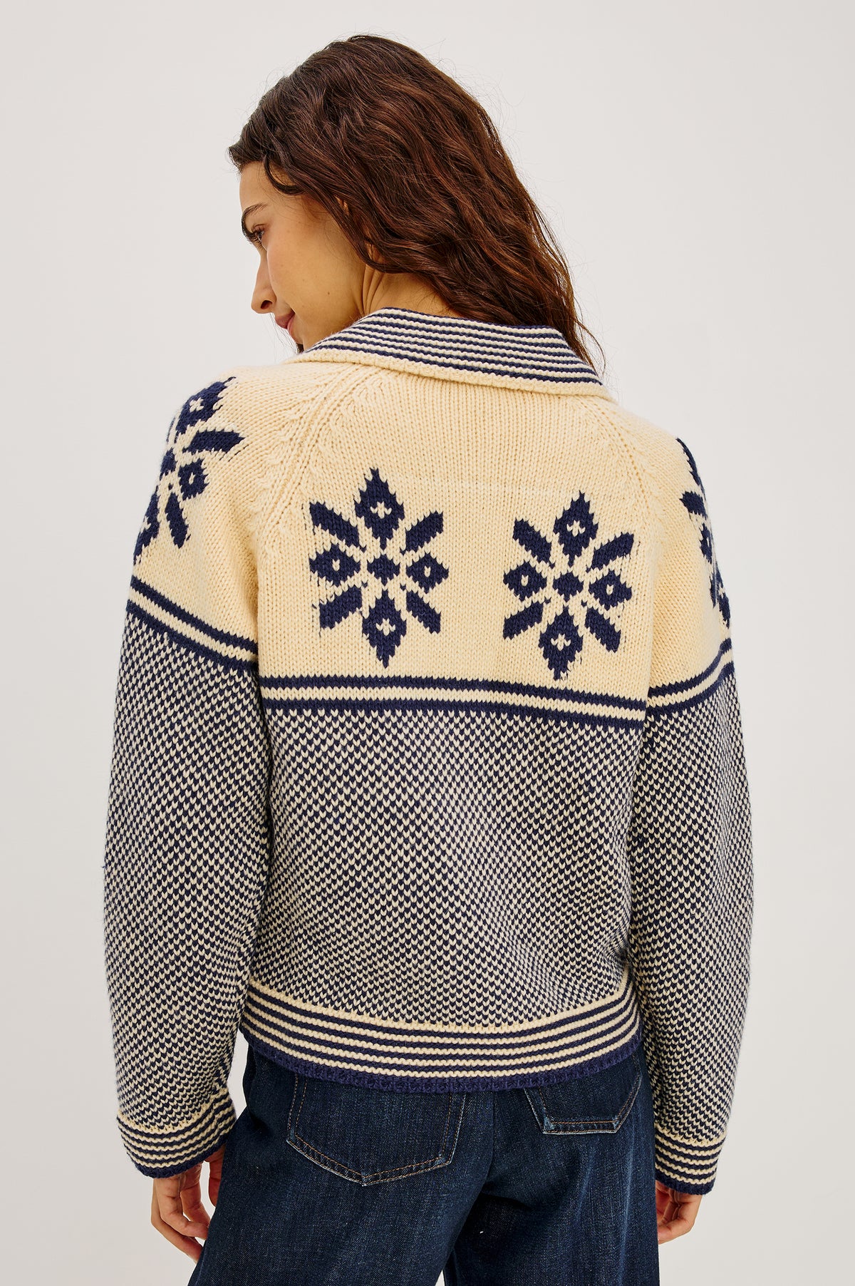 Hilde Cardigan in Fair Isle Jacquard Knit With Relaxed Fit, Wide Collar, Front Buttons, and Long Sleeves in Snowflake Colorway - Upper Body Back View Featured on Model.