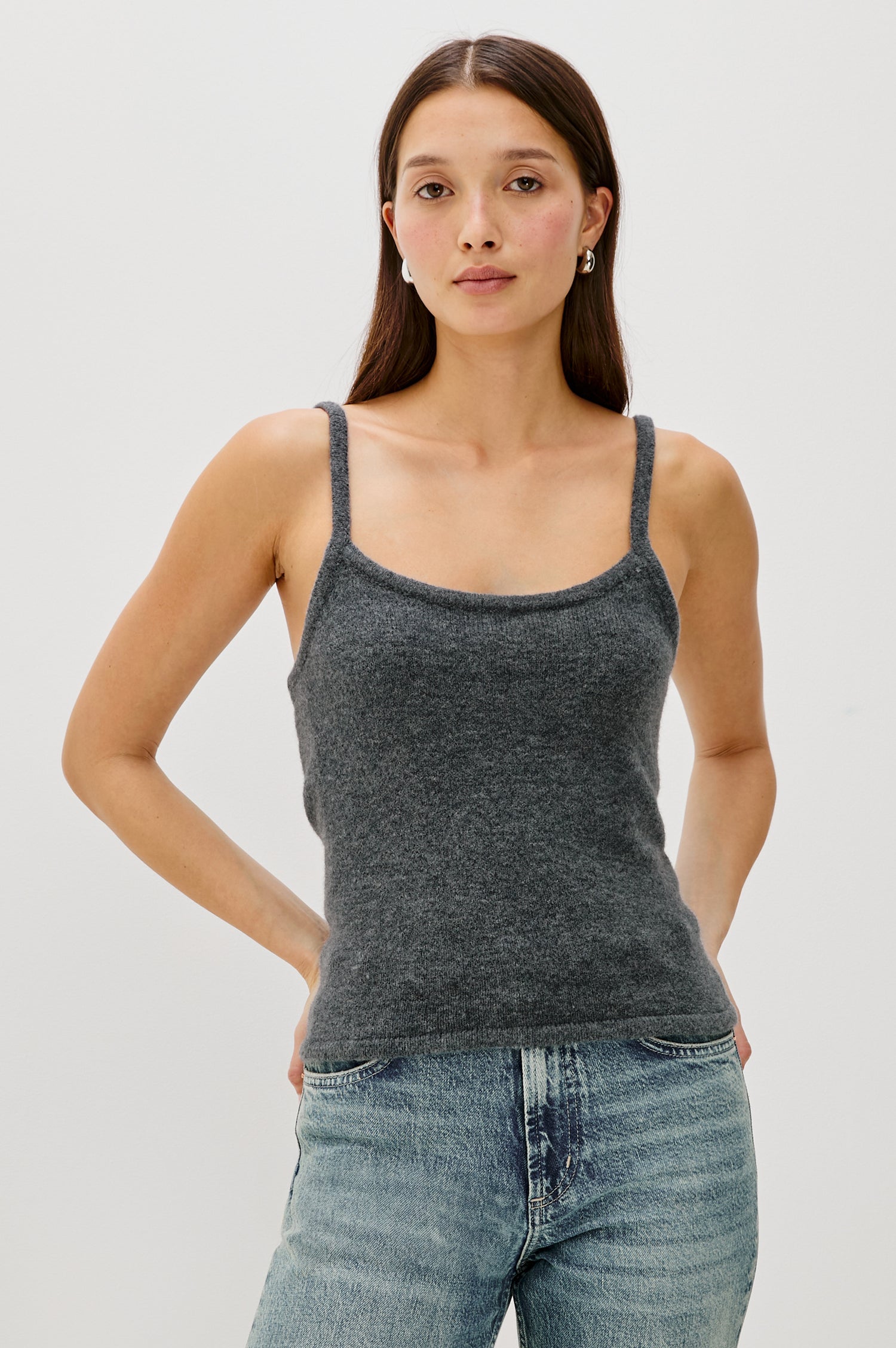 A knitted wool-blend tank top with a simple, classic fit in Charcoal Colorway. Front View featured on Model.
