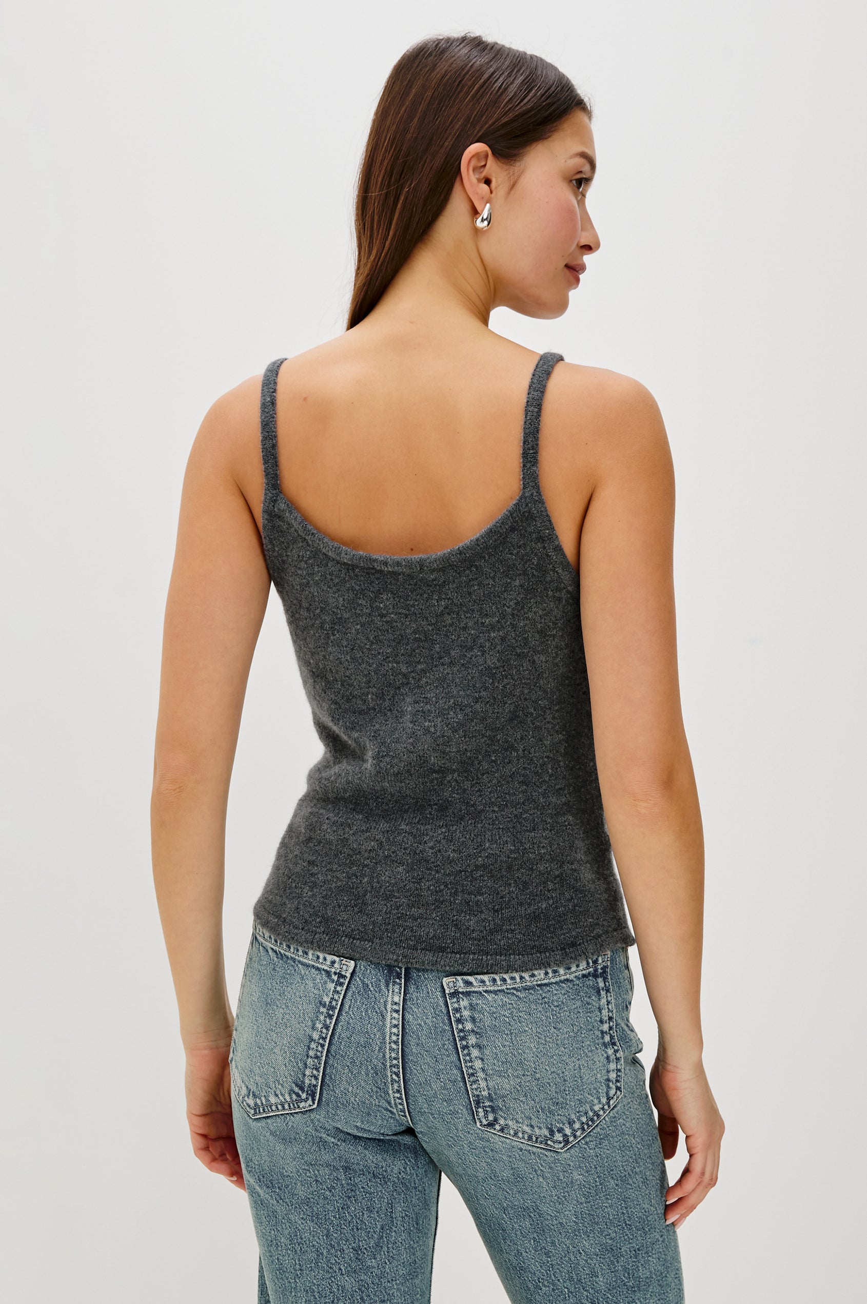 A knitted wool-blend tank top with a simple, classic fit in Charcoal Colorway. Back View featured on Model.