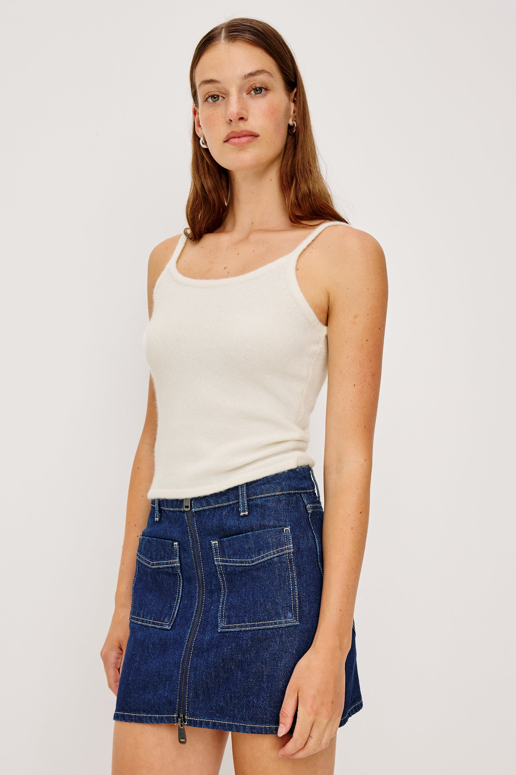 A knitted wool-blend tank top with a simple, classic fit in Ivory Colorway. Front View featured on Model.