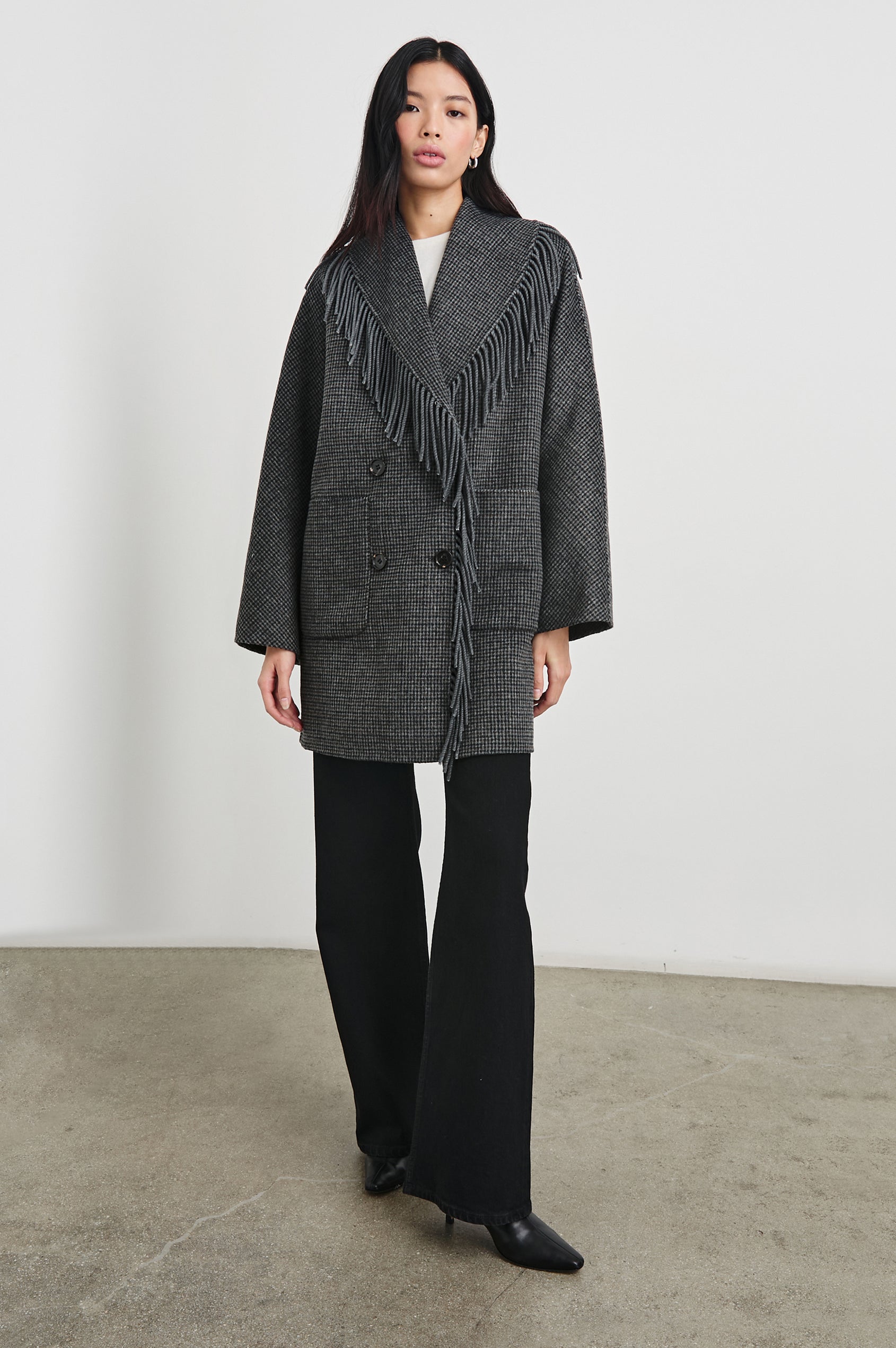 Hugo Double-Breasted, Mid-Thigh Length Coat with Button Closure, Wide Lapels, Two Front Patch Pockets and Fringe along the Lapels and Closure in Charcoal Check Colorway, a plaid - Front Full Body View Featured on Model 