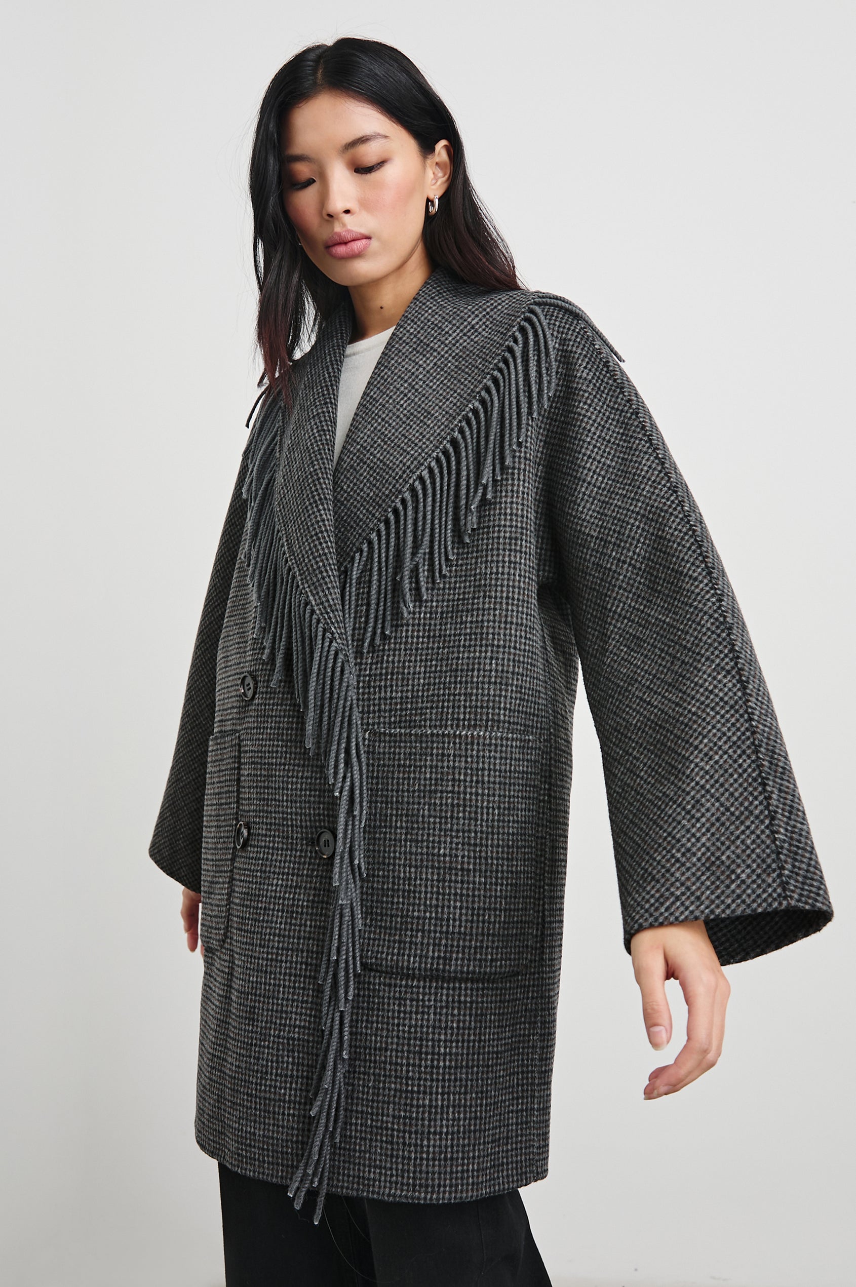 Hugo Double-Breasted, Mid-Thigh Length Coat with Button Closure, Wide Lapels, Two Front Patch Pockets and Fringe along the Lapels and Closure in Charcoal Check Colorway, a plaid - Front View Featured on Model 