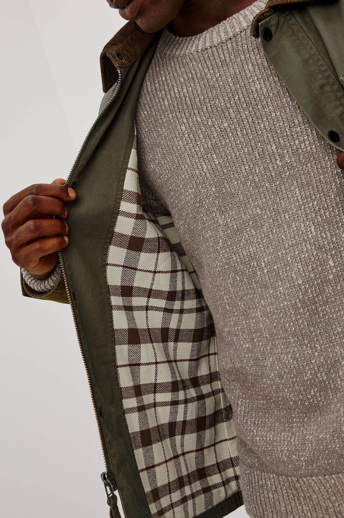 Huntly Jacket in Twill With Plaid Lining, Corduroy Collar, Storm Flap Snap-and-Zip, Four Front Snap Flap Pockets, and Long Sleeves in Highland Colorway - Upper Body Close Up View Featured on Model