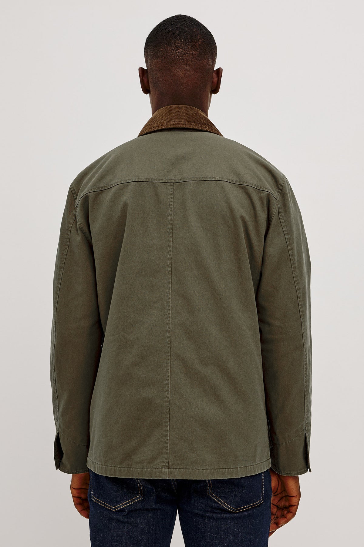 Huntly Jacket in Twill With Plaid Lining, Corduroy Collar, Storm Flap Snap-and-Zip, Four Front Snap Flap Pockets, and Long Sleeves in Highland Colorway - Upper Body Back View Featured on Model