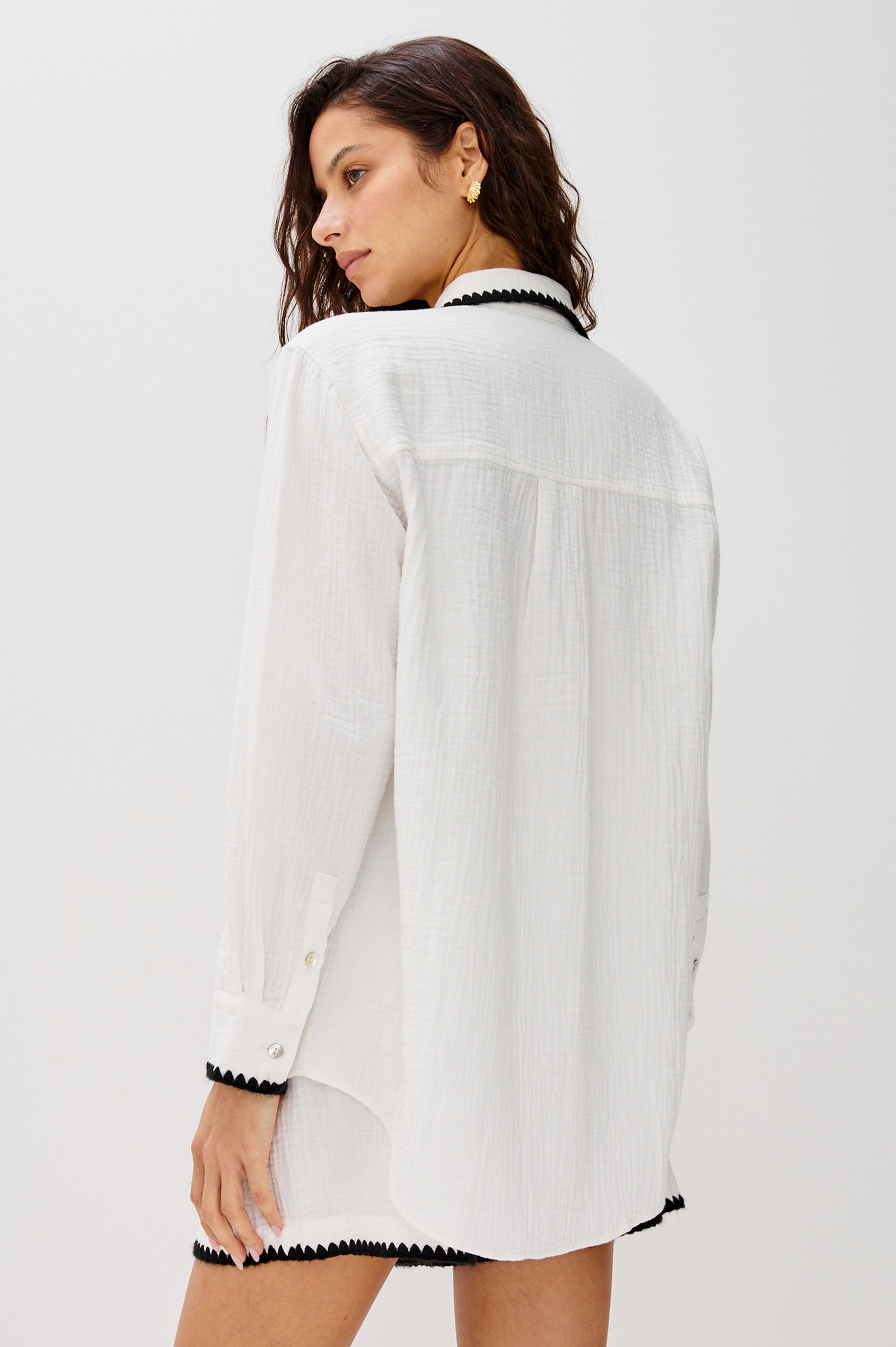 Idania Button Front Collared Shirt with Long Sleeves, Relaxed Fir and a Front Chest Pocket with a White Body in Black Blanket Stich Colorway. Back View Shown on Model.