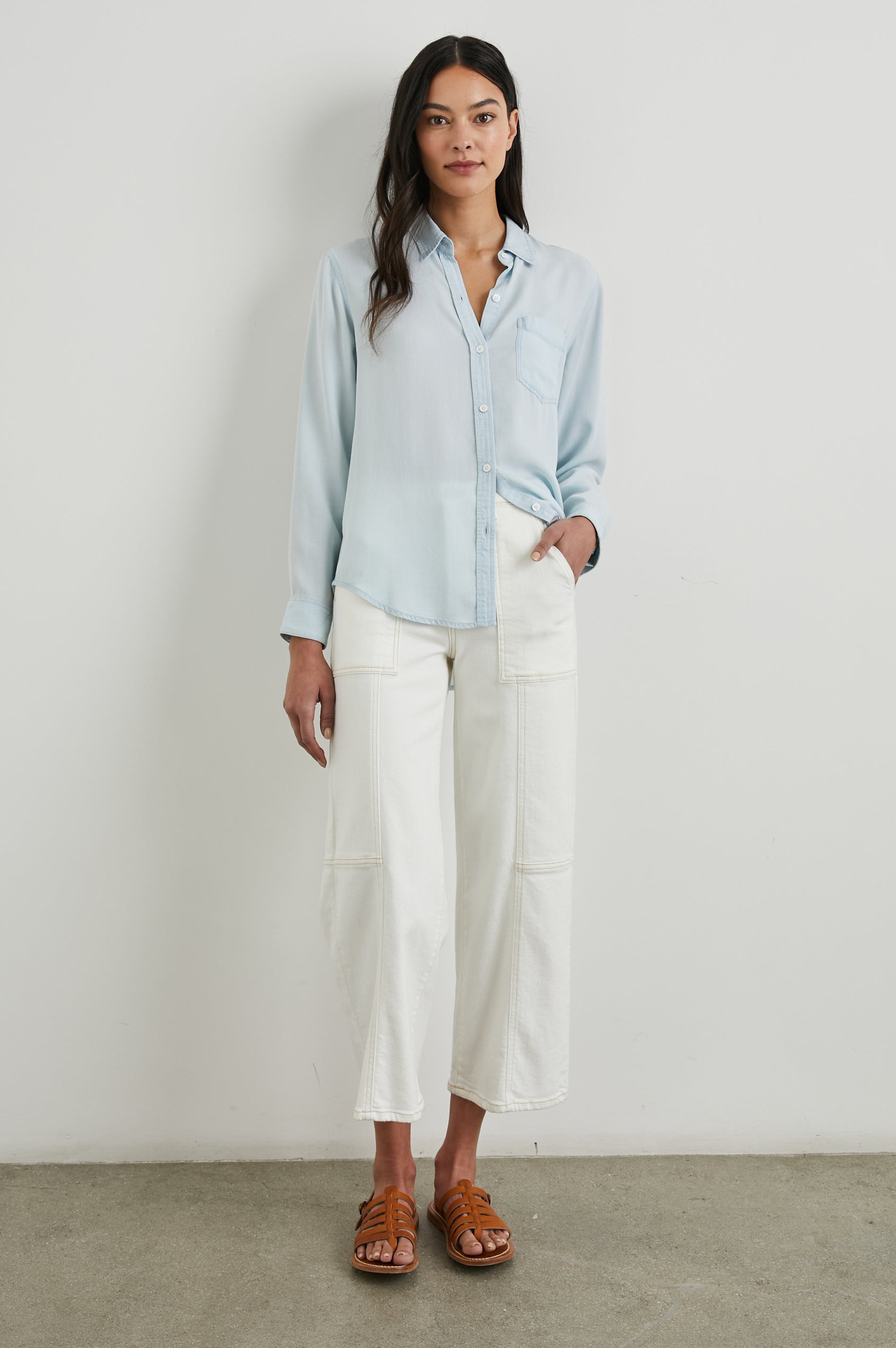 Ingrid Long Sleeve Denim Button Up with a Chest Patch Pocket in Light Vintage Colorway - Front Full Body View Featured on Model