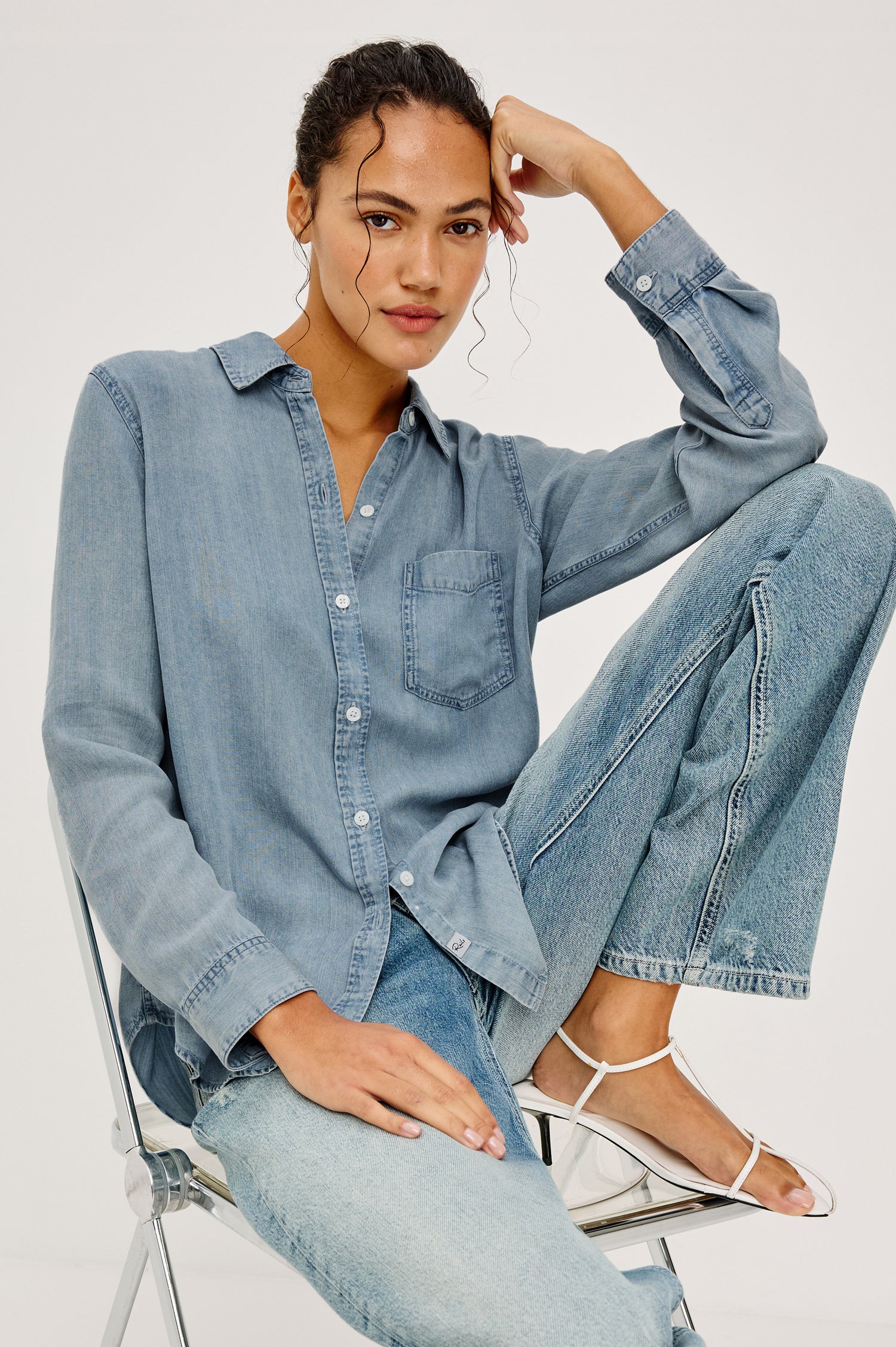 Ingrid Button-Up Collared Shirt in TENCEL™Denim With Vintage-Inspired Wash, Chest Patch Pocket, and Long Sleeves in Cloud Wash Colorway - Upper Body Front View Featured on Model