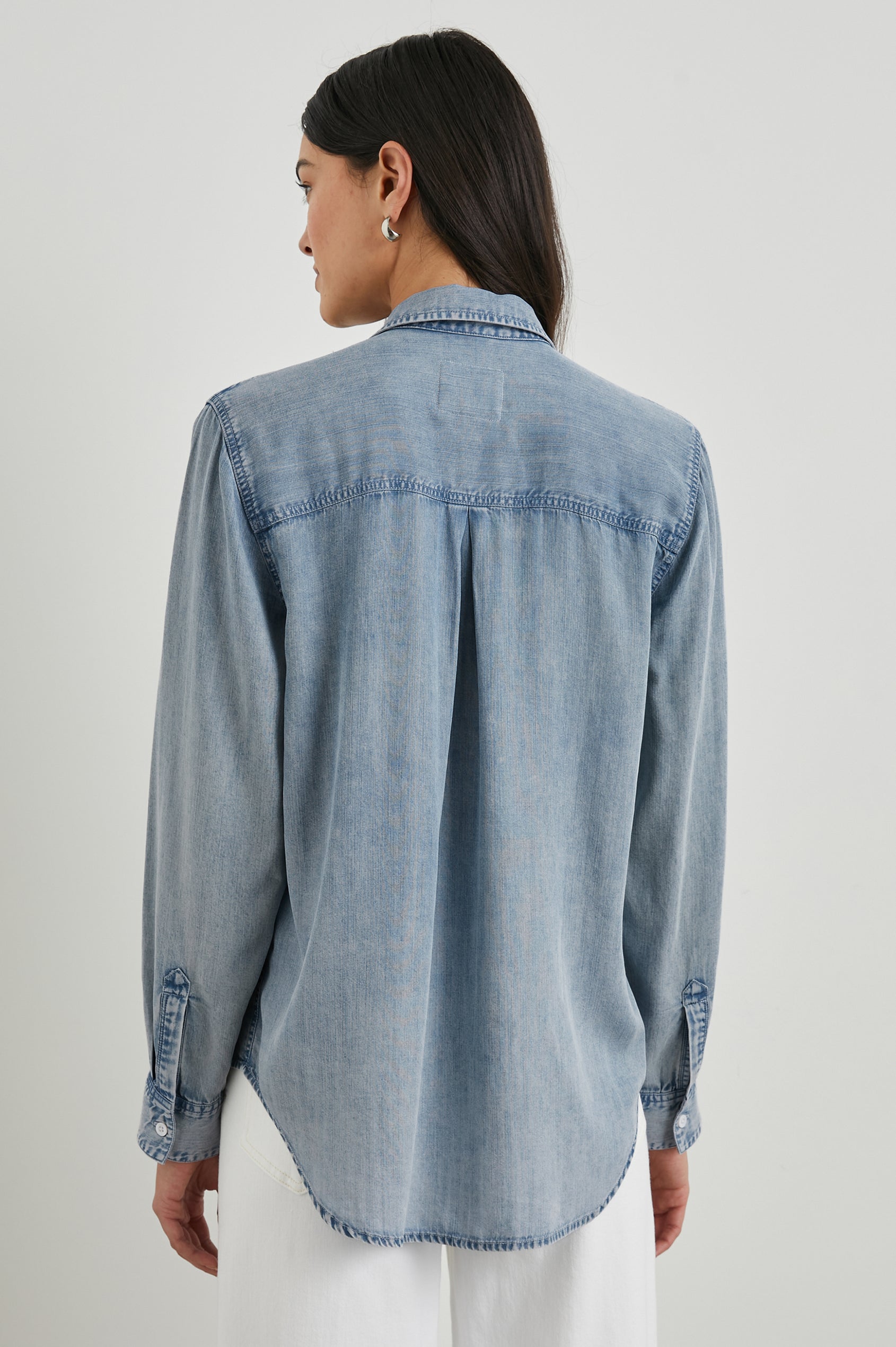 Ingrid Long Sleeve Denim Button Up with a Chest Patch Pocket in Med Vintage Cloud Wash Colorway - Back View Featured on Model