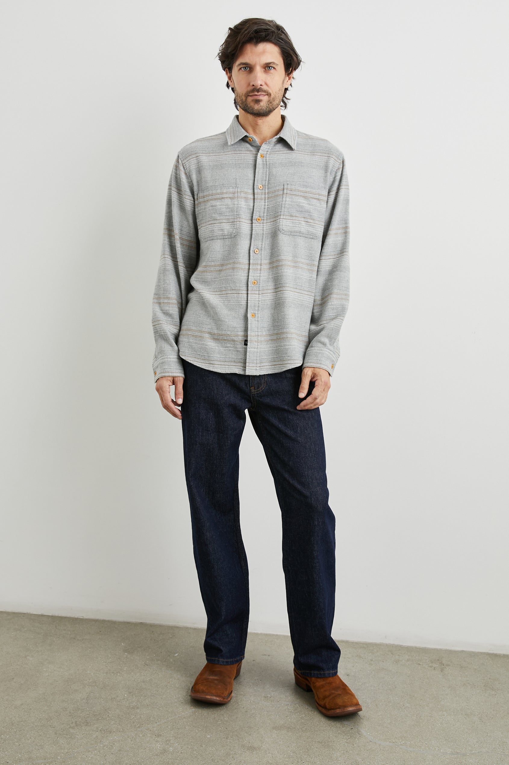 Ivan Long-Sleeve Button Up with Two Chest Patch Pockets in Grey Serape Colorway, with horizontal stripes in browns and greys on Grey - Front Full Body View Featured on Model
