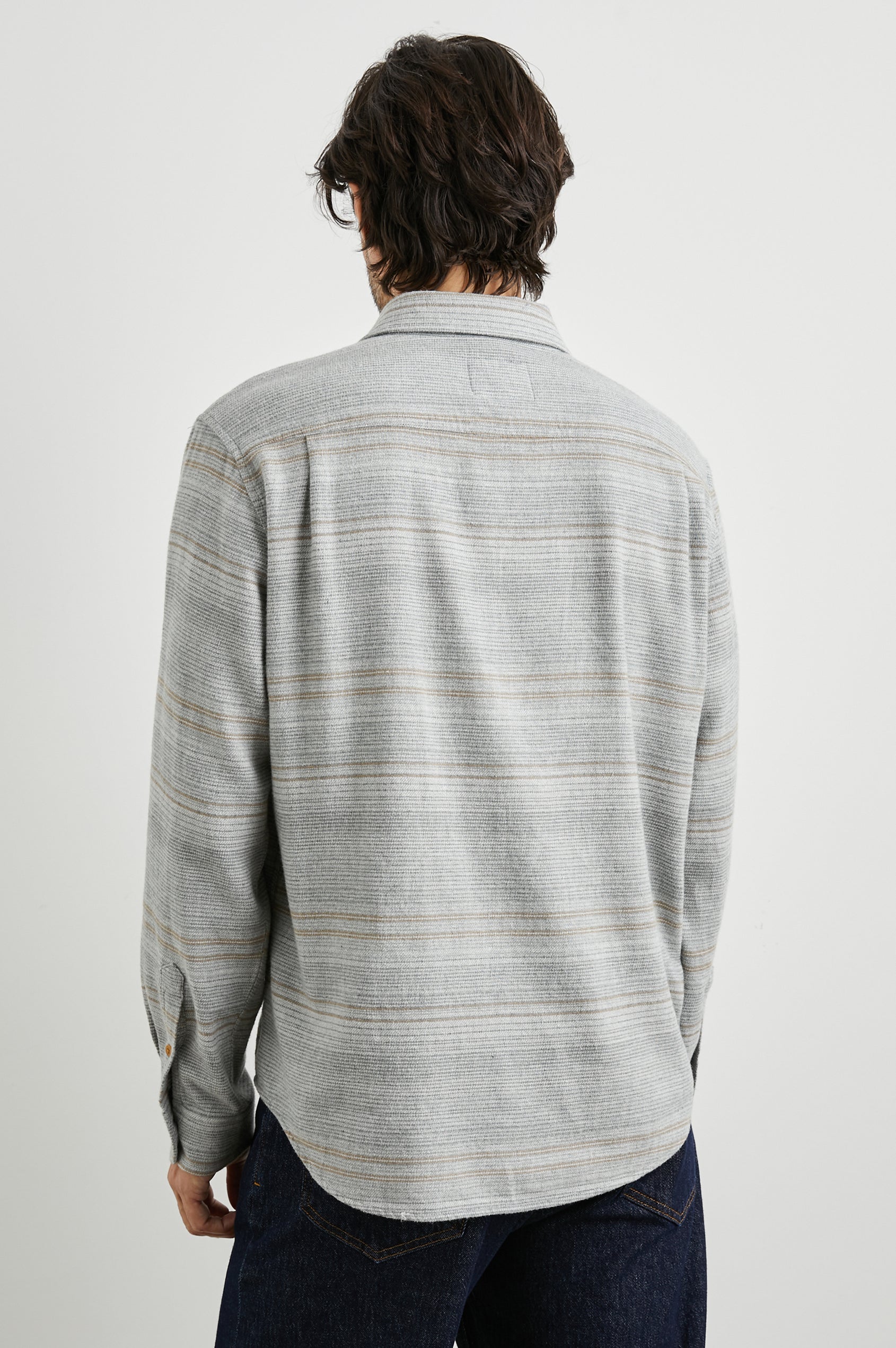 Ivan Long-Sleeve Button Up with Two Chest Patch Pockets in Grey Serape Colorway, with horizontal stripes in browns and greys on Grey - Back View Featured on Model