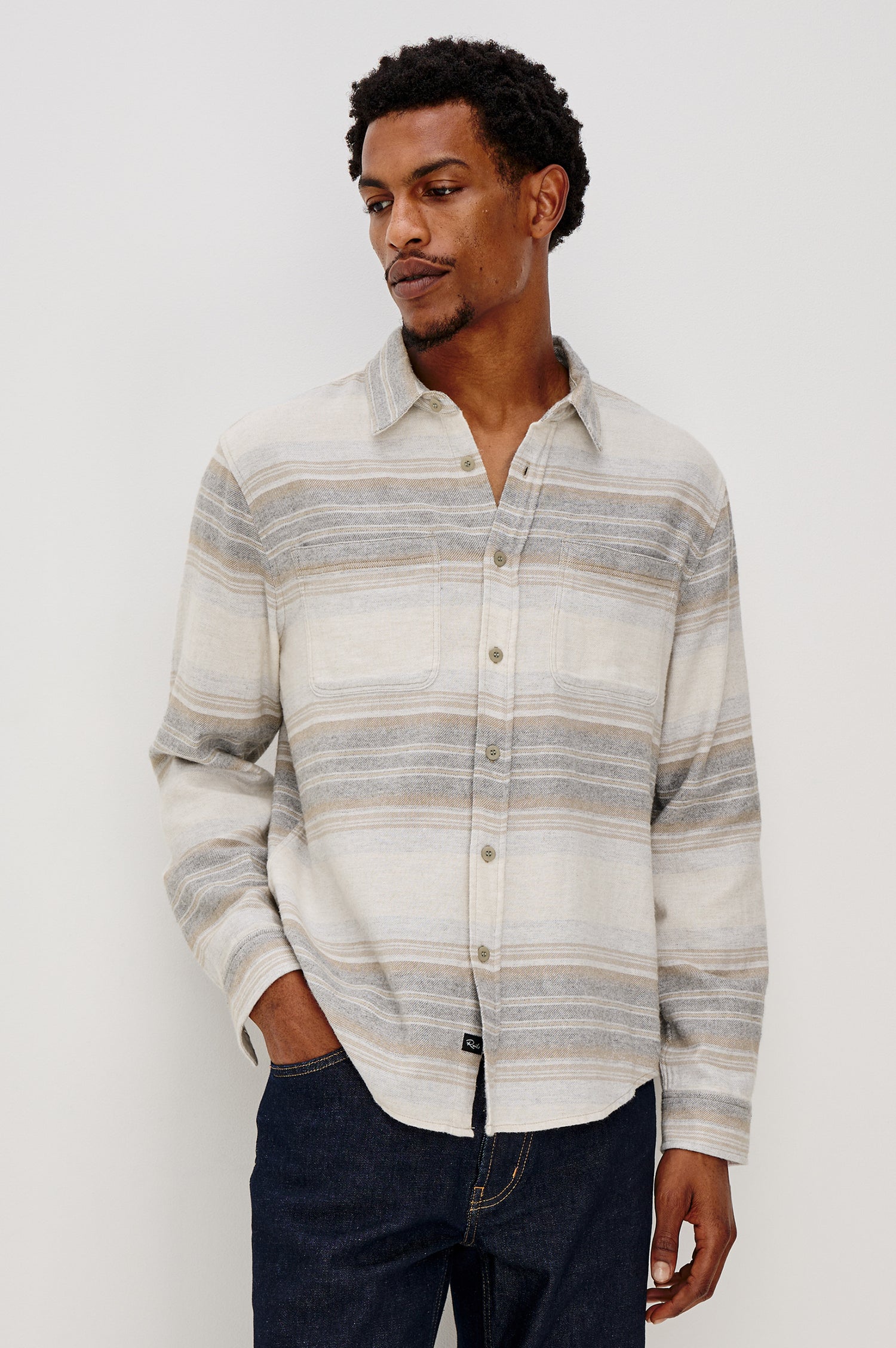 Ivan button front collared shirt with long sleeves and two chest pockets in horizontal stripe - lunar rock stripe colorway. Front View on Model Shown.