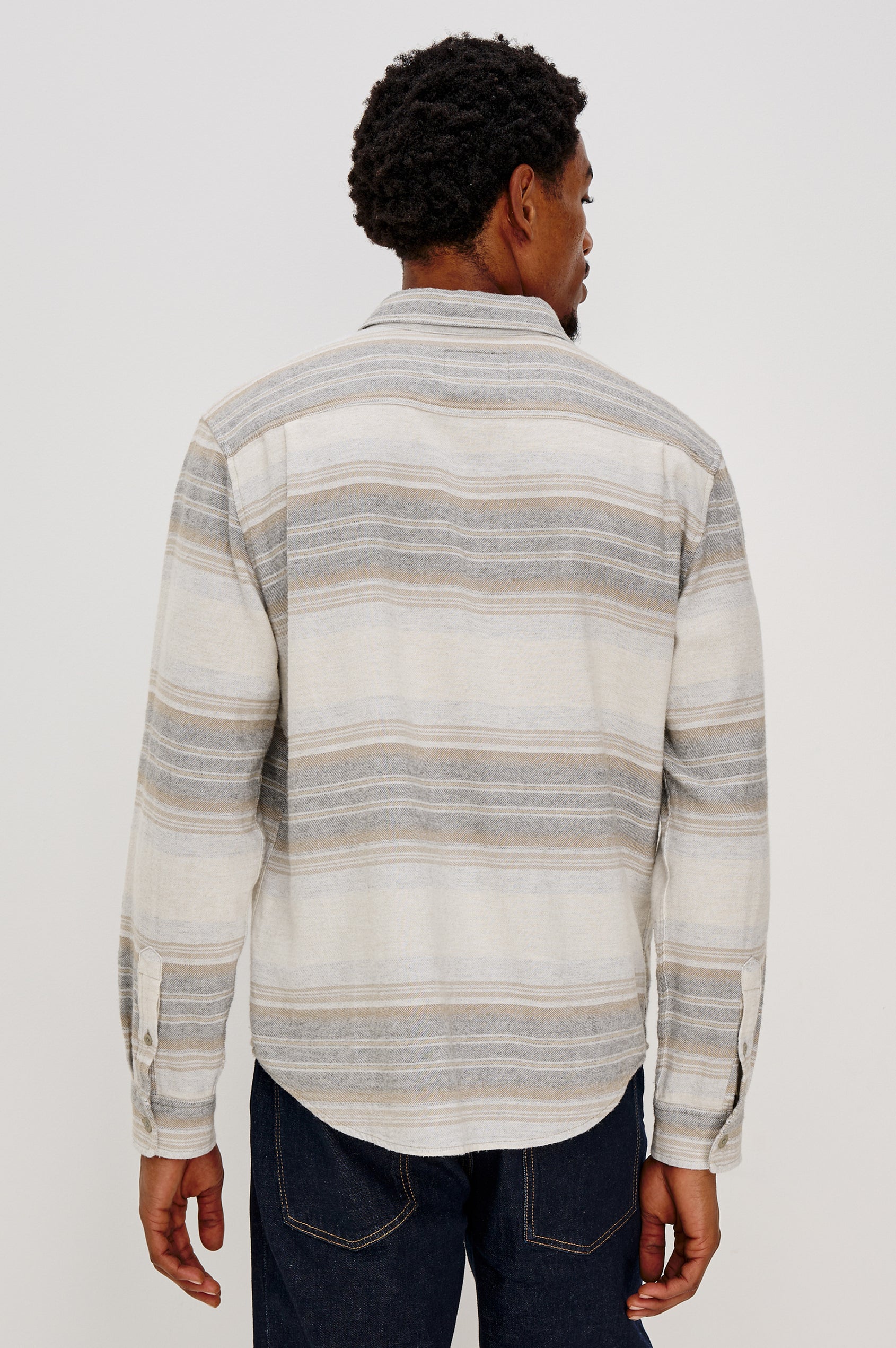 Ivan button front collared shirt with long sleeves and two chest pockets in horizontal stripe - lunar rock stripe colorway. Back View of Model Shown.