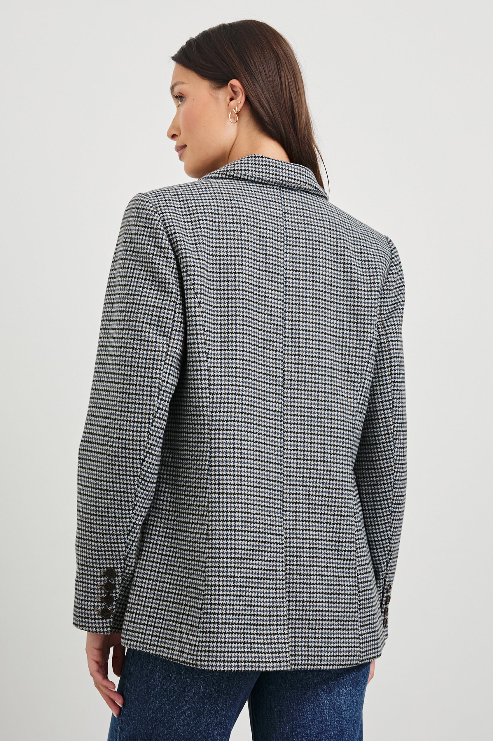 Jac Double-Breasted Blazer with Two Front Flap Pockets and a Notched Label in Black Lapiz Colorway, Houndstooth with black, blue, brown and cream - Back View Featured on Model