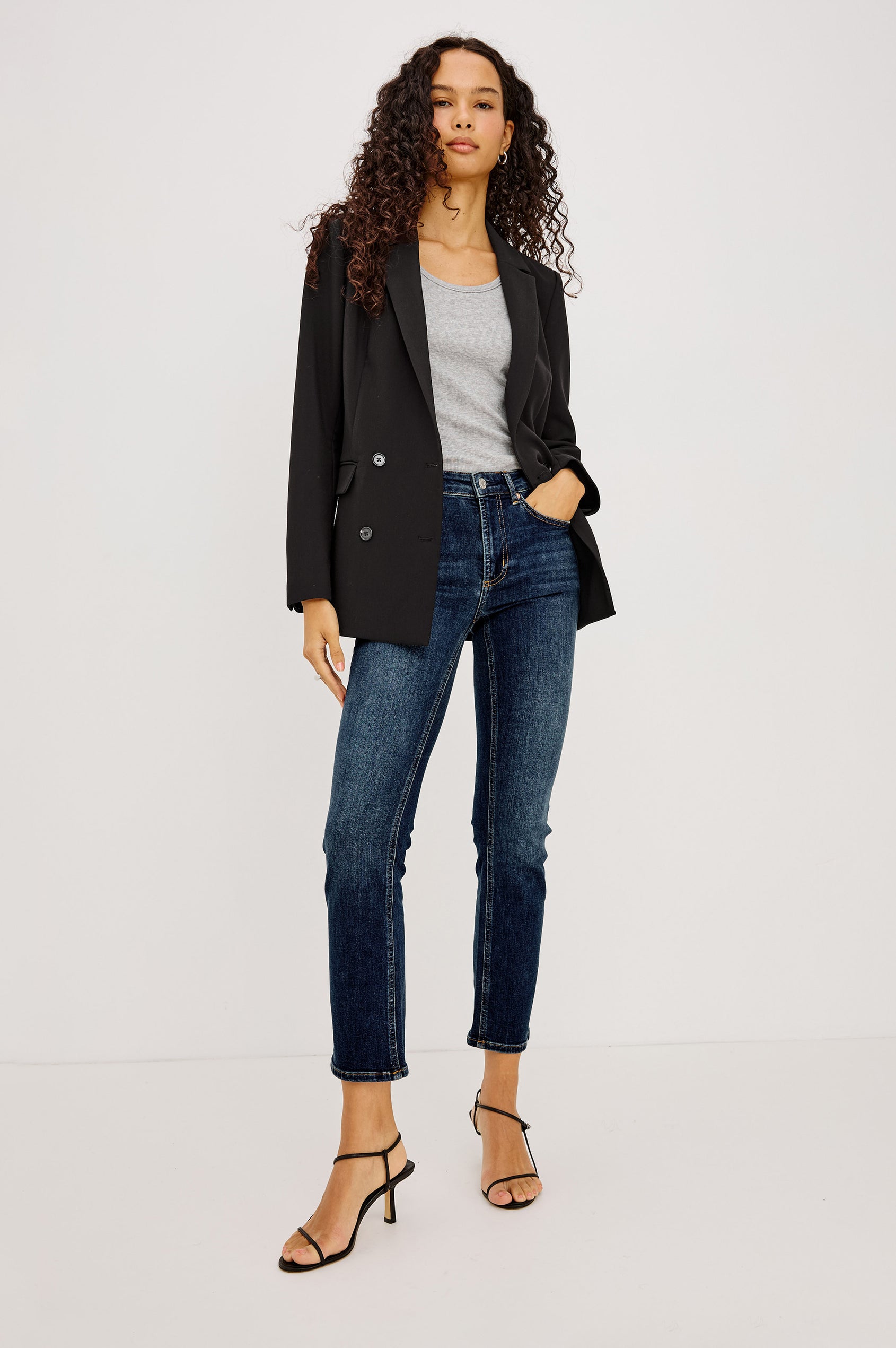 Jac Blazer in Wool Blend With Double-Breasted Design, Notched Lapels, Long Sleeves, Side Flap Pockets, and Fully Lined in Black Colorway - Full Body Front View Featured on Model
