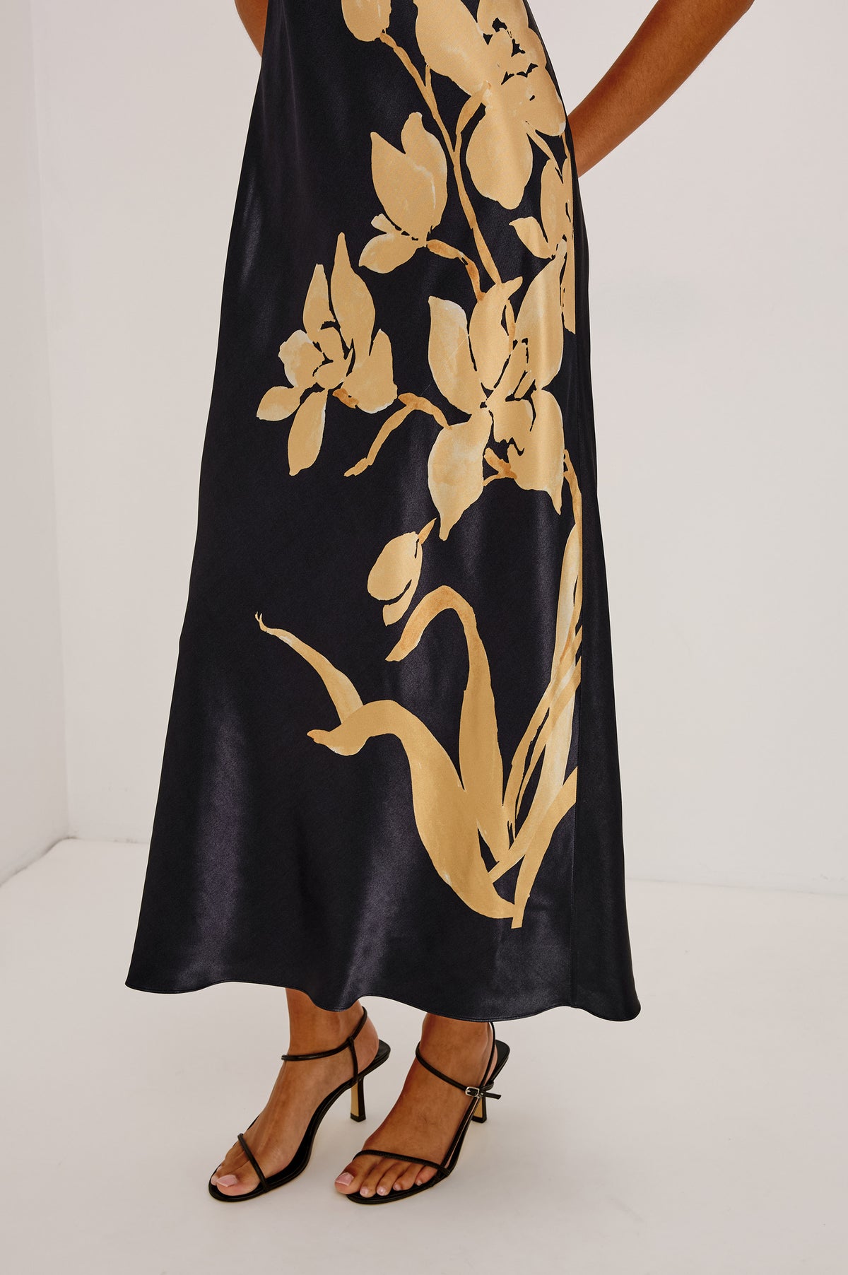 Jaya Midi Dress in Satin-Back Crepe With Scoop Neckline and Adjustabel Spaghetti Straps in Gold Lily Colorway - Upper Body Front Detail View Featured on Model.