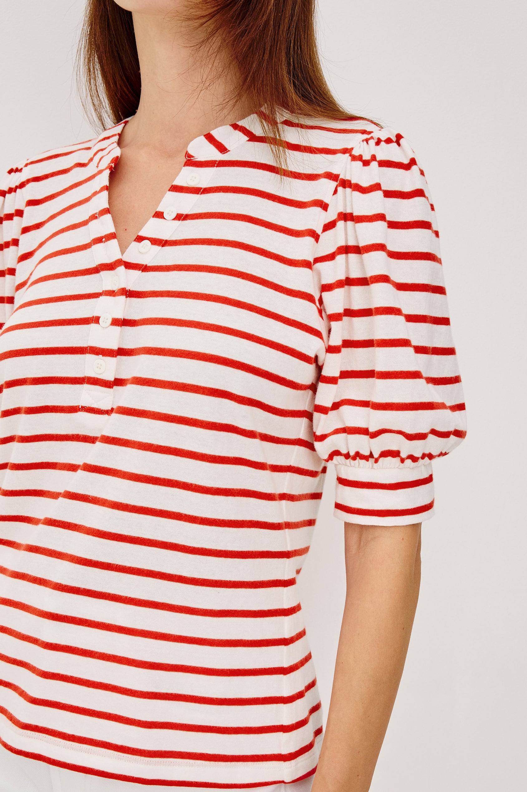Jewel Top WIth Band Split V-Neck Front Buttons Short Puff Sleeves and Relaxed Fit in Scarlet Ivory Stripe Colorway - Upper Body Close Up View Featured on Model