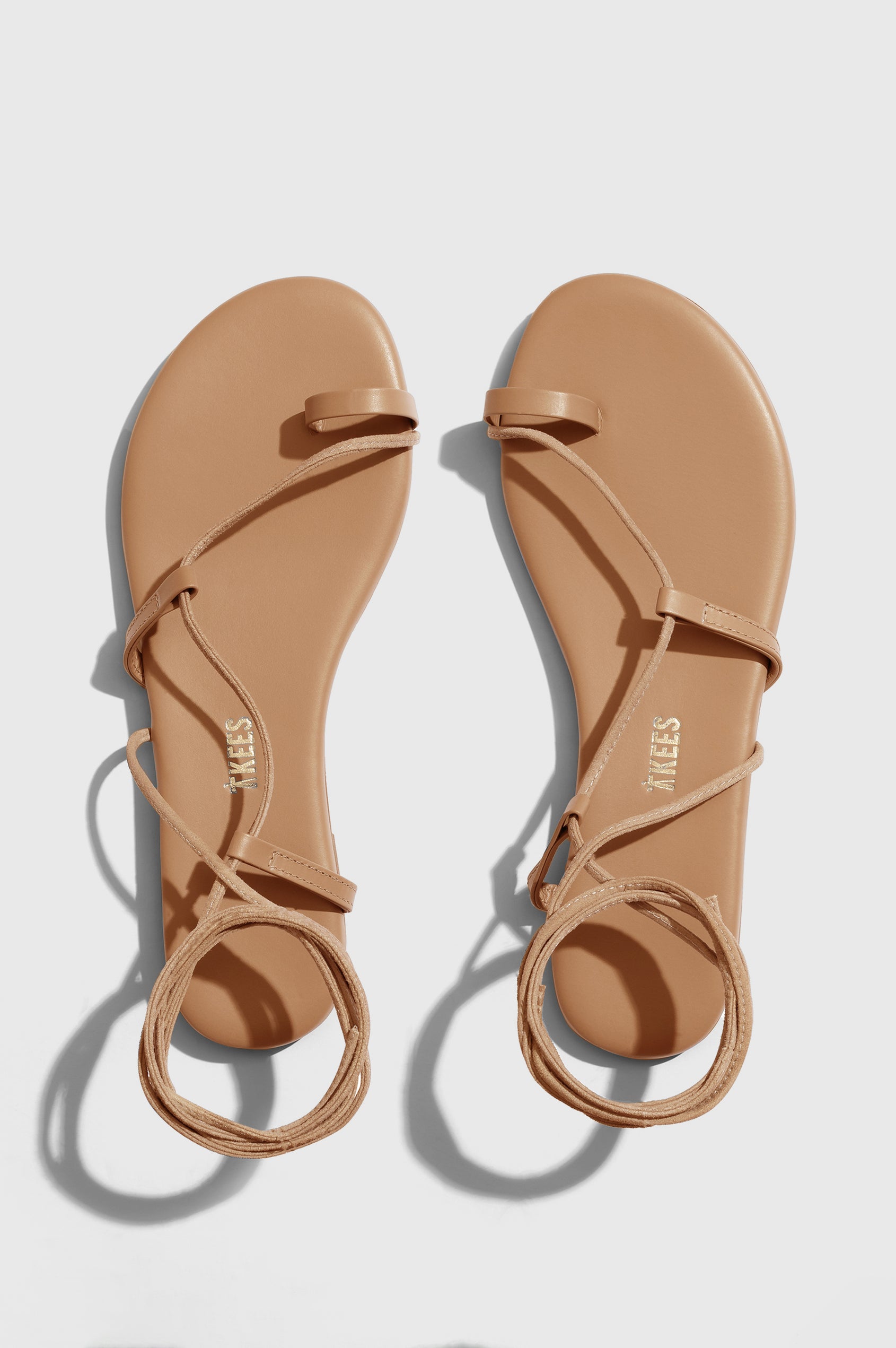 Jo leather sandal with toe loop and crossing straps that wrap the ankle in Hazelton - pair of shoes shot from above angle