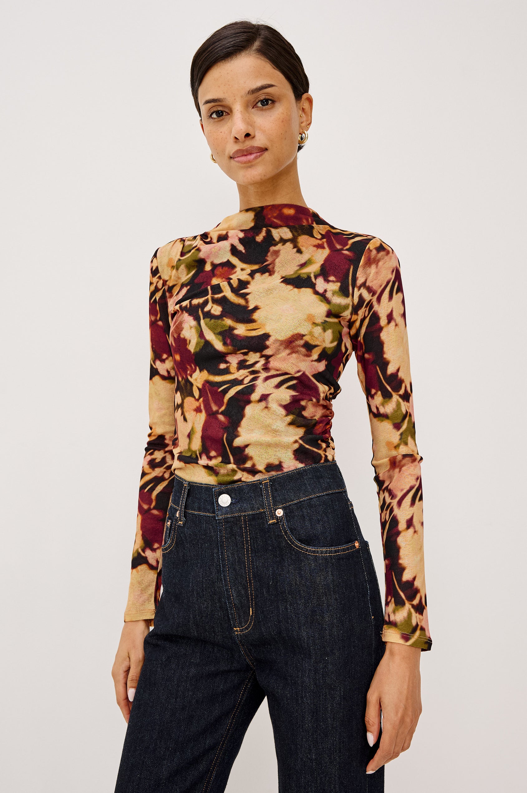 Joelle Top in Mesh With High Funnel Neckline, Long Sleeves, Self-Lined Body, and Asymmetric Ruching at Shoulder and Waist in Dark Flora Colorway - Upper Body Front View Featured on Model