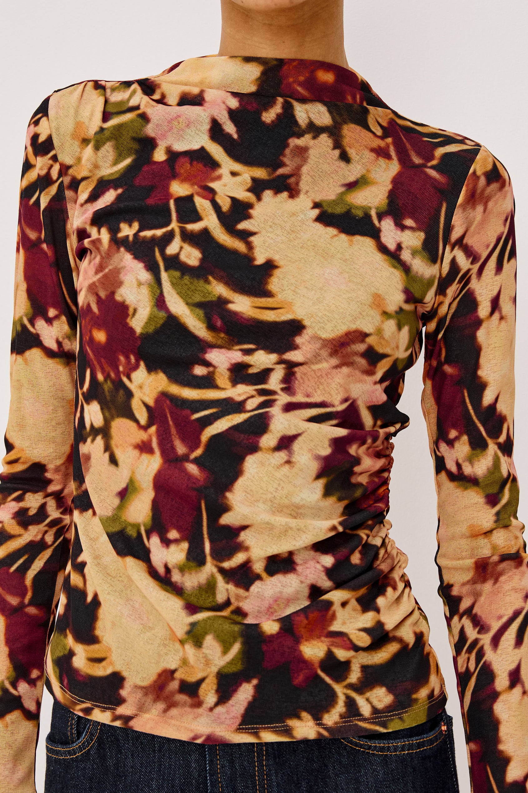 Joelle Top in Mesh With High Funnel Neckline, Long Sleeves, Self-Lined Body, and Asymmetric Ruching at Shoulder and Waist in Dark Flora Colorway - Upper Body Front View Featured on Model