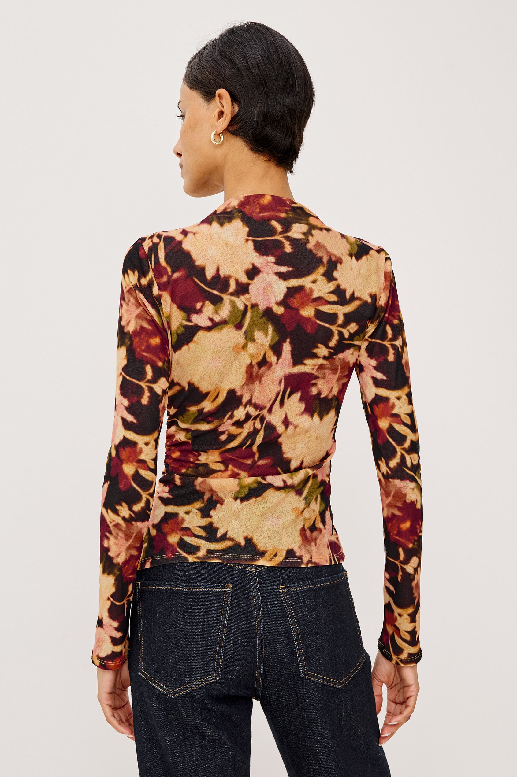 Joelle Top in Mesh With High Funnel Neckline, Long Sleeves, Self-Lined Body, and Asymmetric Ruching at Shoulder and Waist in Dark Flora Colorway - Upper Body Back View Featured on Model