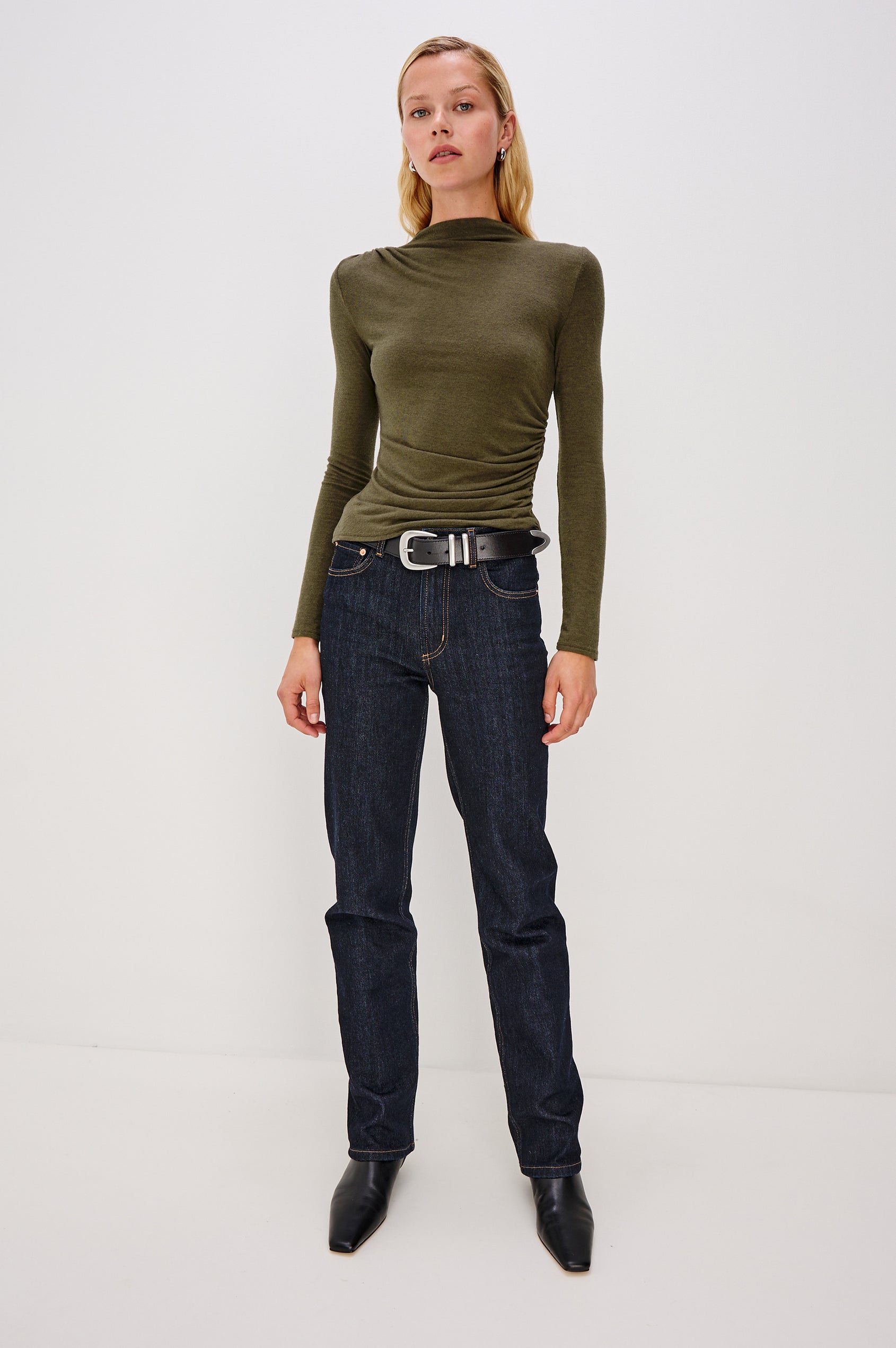 Joelle Long Sleeve Top with An Asymmetrical Mock Neck and Shirring on the Right Shoulder in Heather Olive Colorway - Full Body Front View Featured on Model