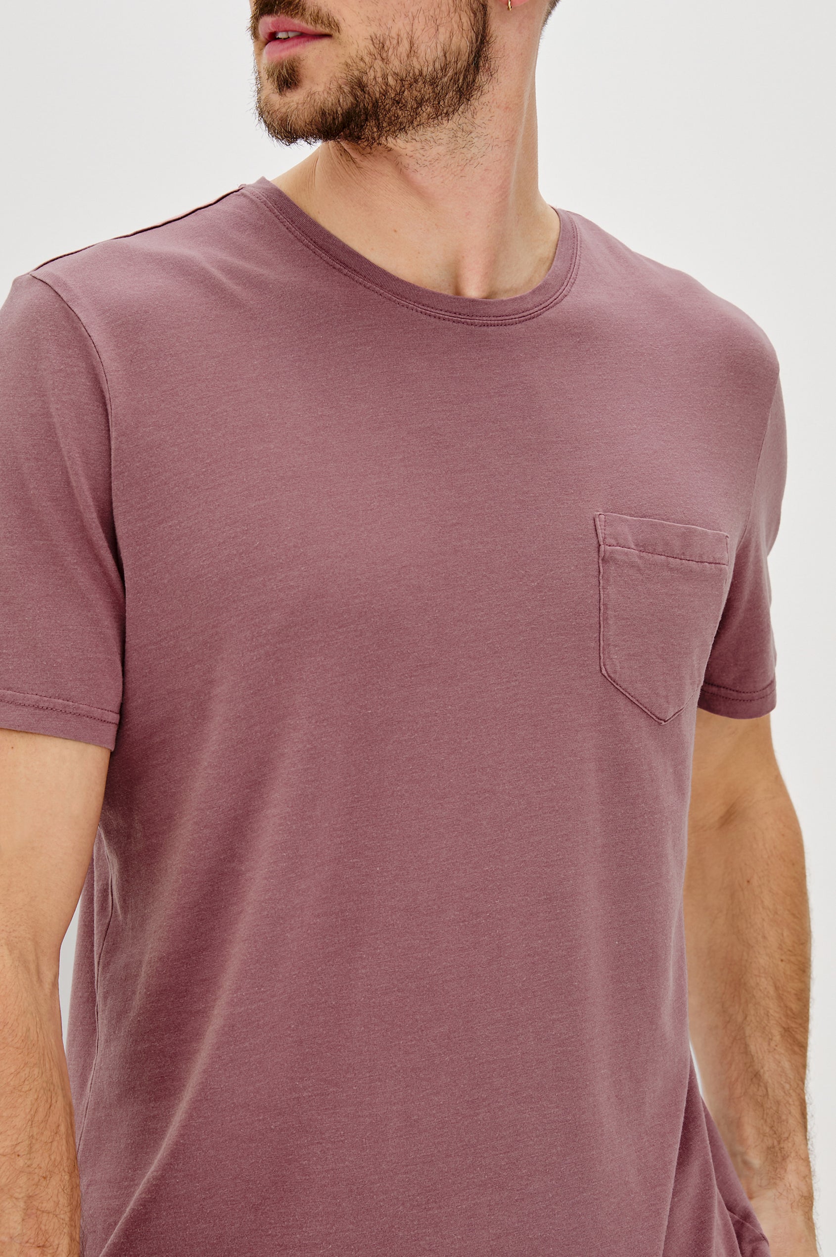 Johnny Short Sleeve T-Shirt with a Crew Neck, Chest Patch Pocket and Small Slits at the Side Hems in Cranberry Colorway - Front View Featured on Model