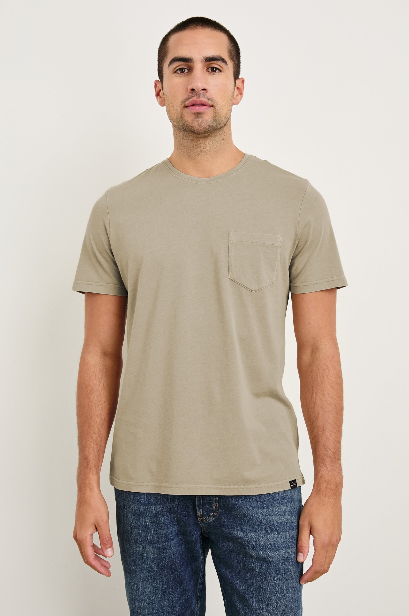 Johnny cotton jersey t-shirt with front chest pocket in Desert Sand - front view on model