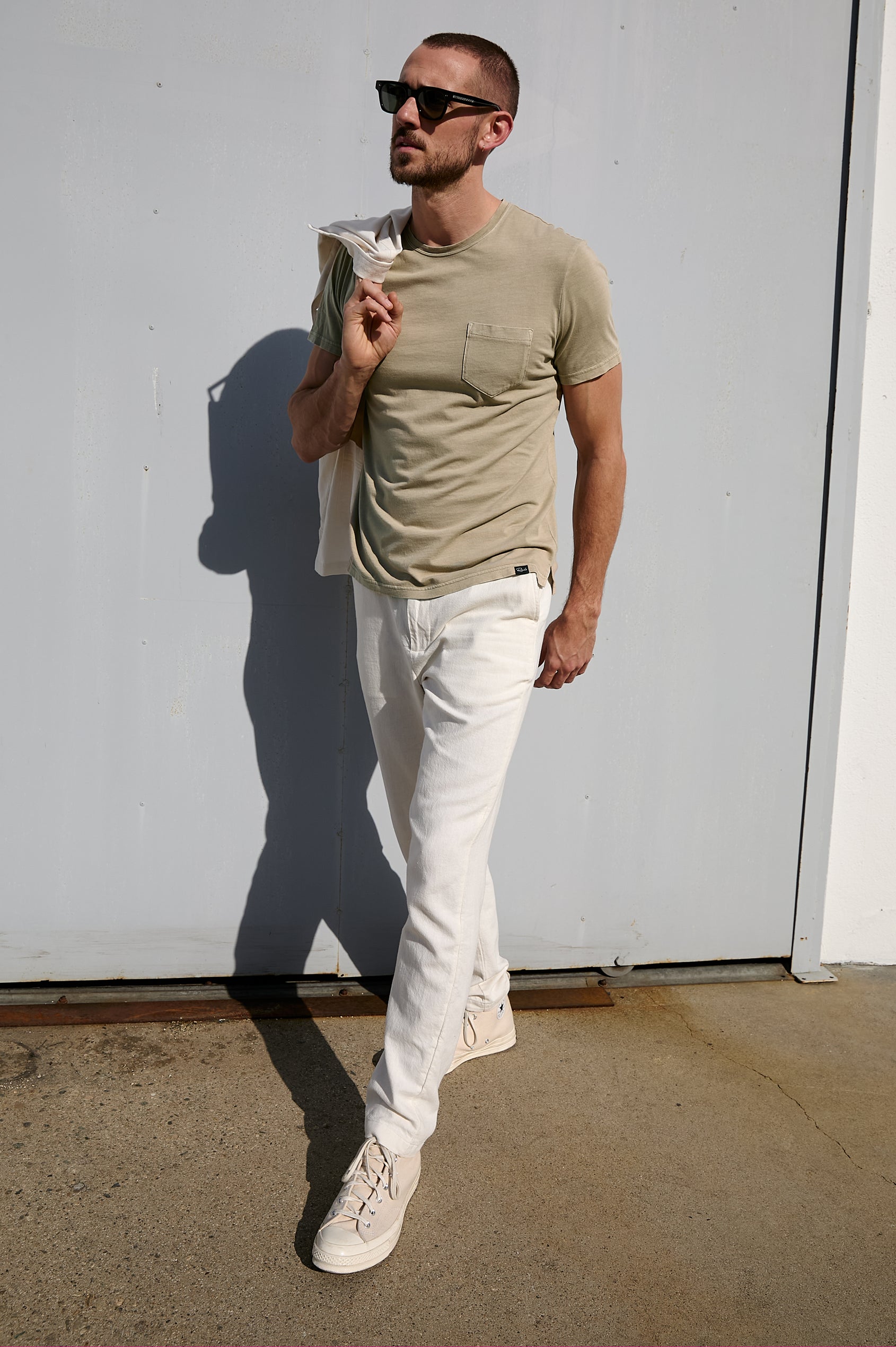 Johnny cotton jersey t-shirt with front chest pocket in Desert Sand - full body front view on model