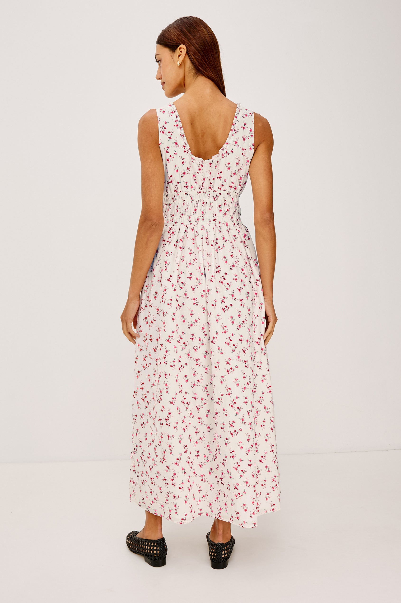 Jordie Maxi Dress in Cotton Voile With A-Line Silhouette, Rounded Square Neckline, Ruffle Trim, Center-Front Bust Cutrout With Self-Ties, Smocked Waist, Side Pockets, and Fully Lined Skirt in Rouge Romantic Colorway - Full Body Back View Featured on Model