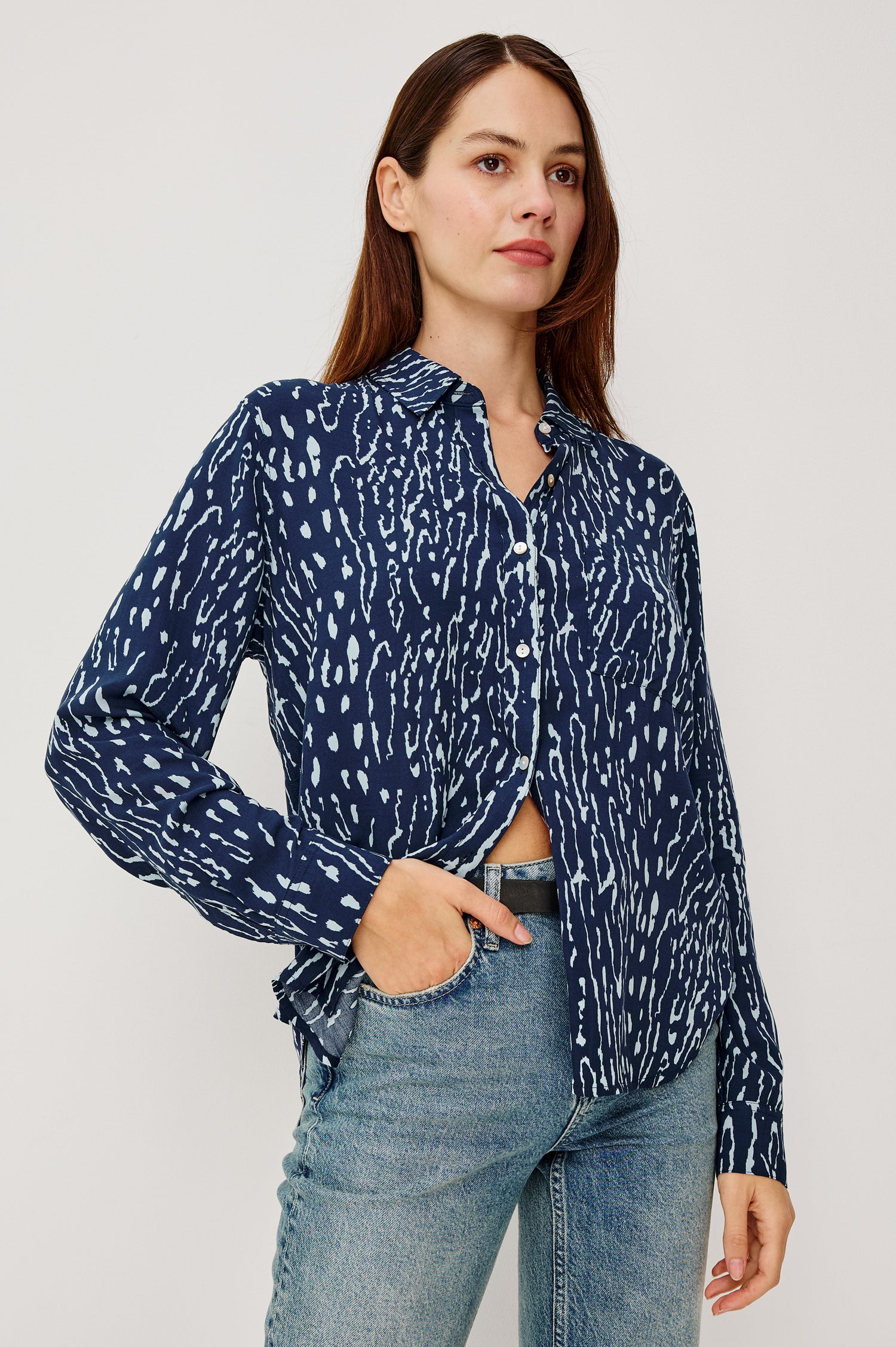 Josephine Button-Up Shirt in Rayon With Collar, Front Buttons, Chest Pockets, and Long Sleeves in Dark Navy Lynx Colorway - Side View Featured on Model