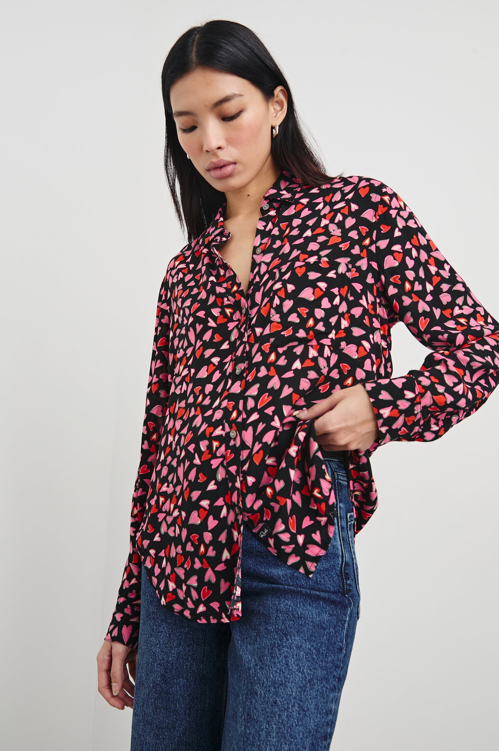 Josephine Long-Sleeve Button Down with a Chest Patch Pocket in Love Struck Colorway, hearts in red and pinks on black - Front View Featured on Model