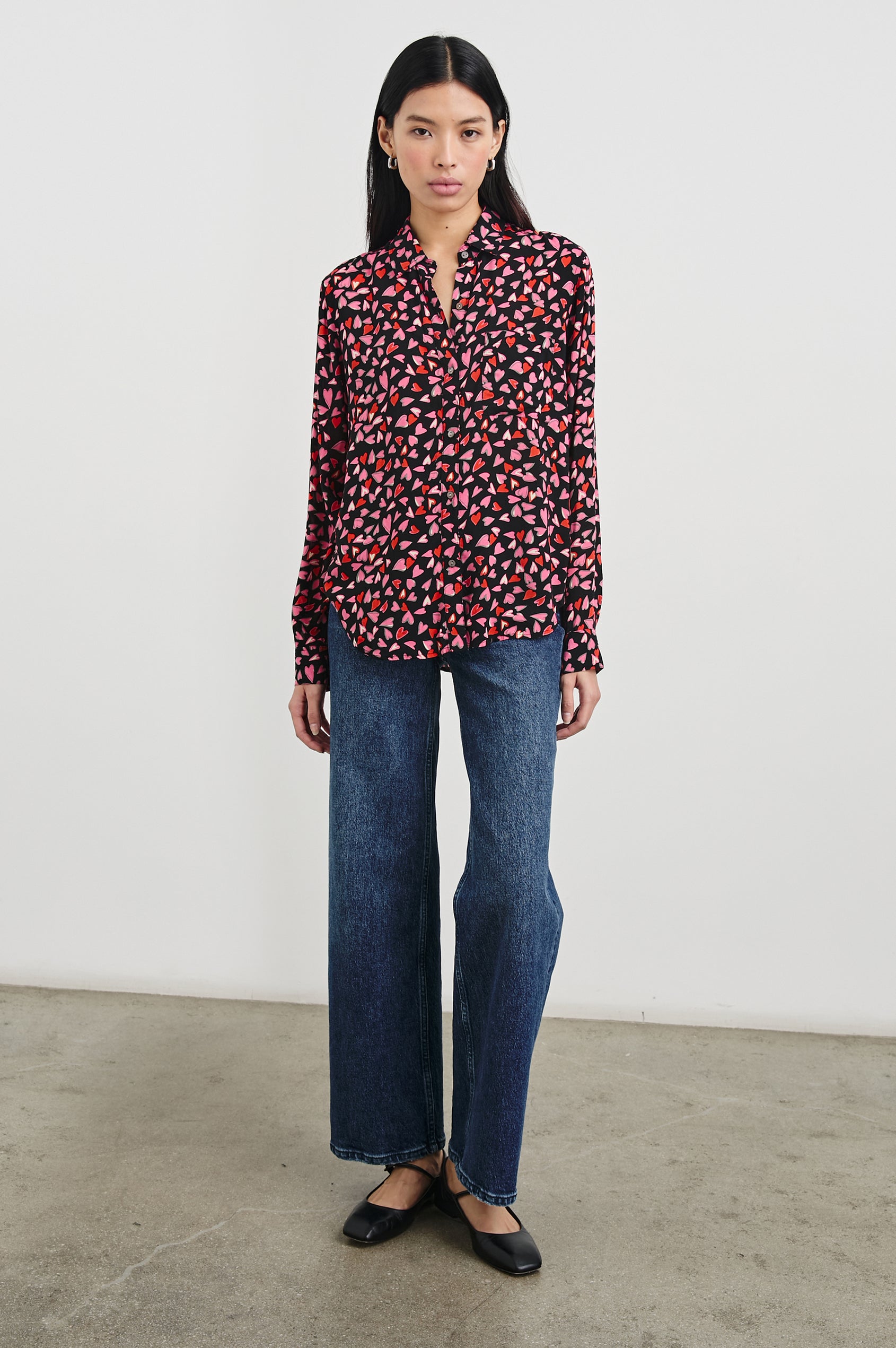 Josephine Long-Sleeve Button Down with a Chest Patch Pocket in Love Struck Colorway, hearts in red and pinks on black - Front Full Body View Featured on Model